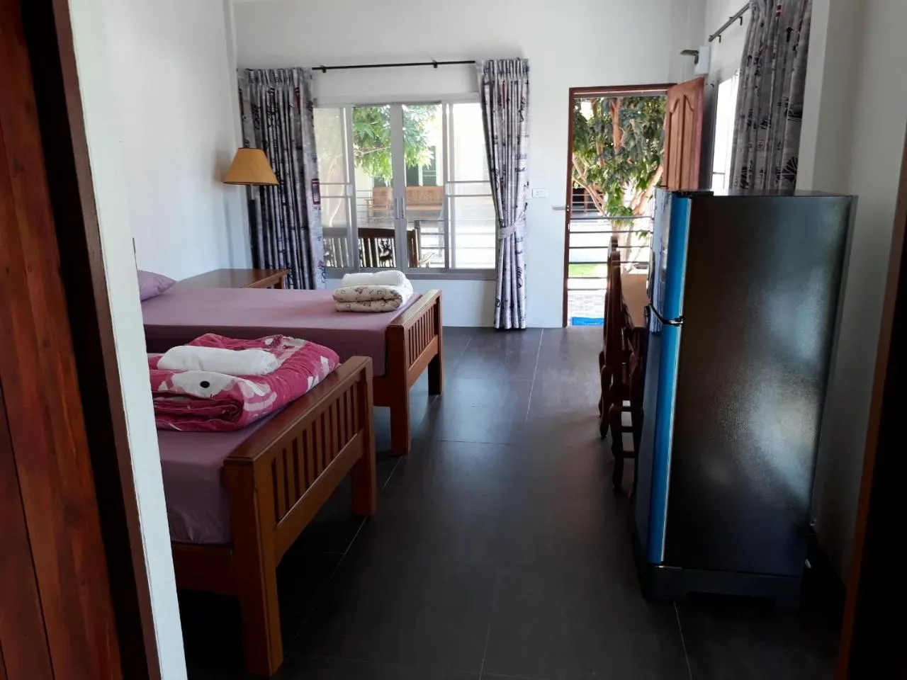 Bed in Green Mango Resort