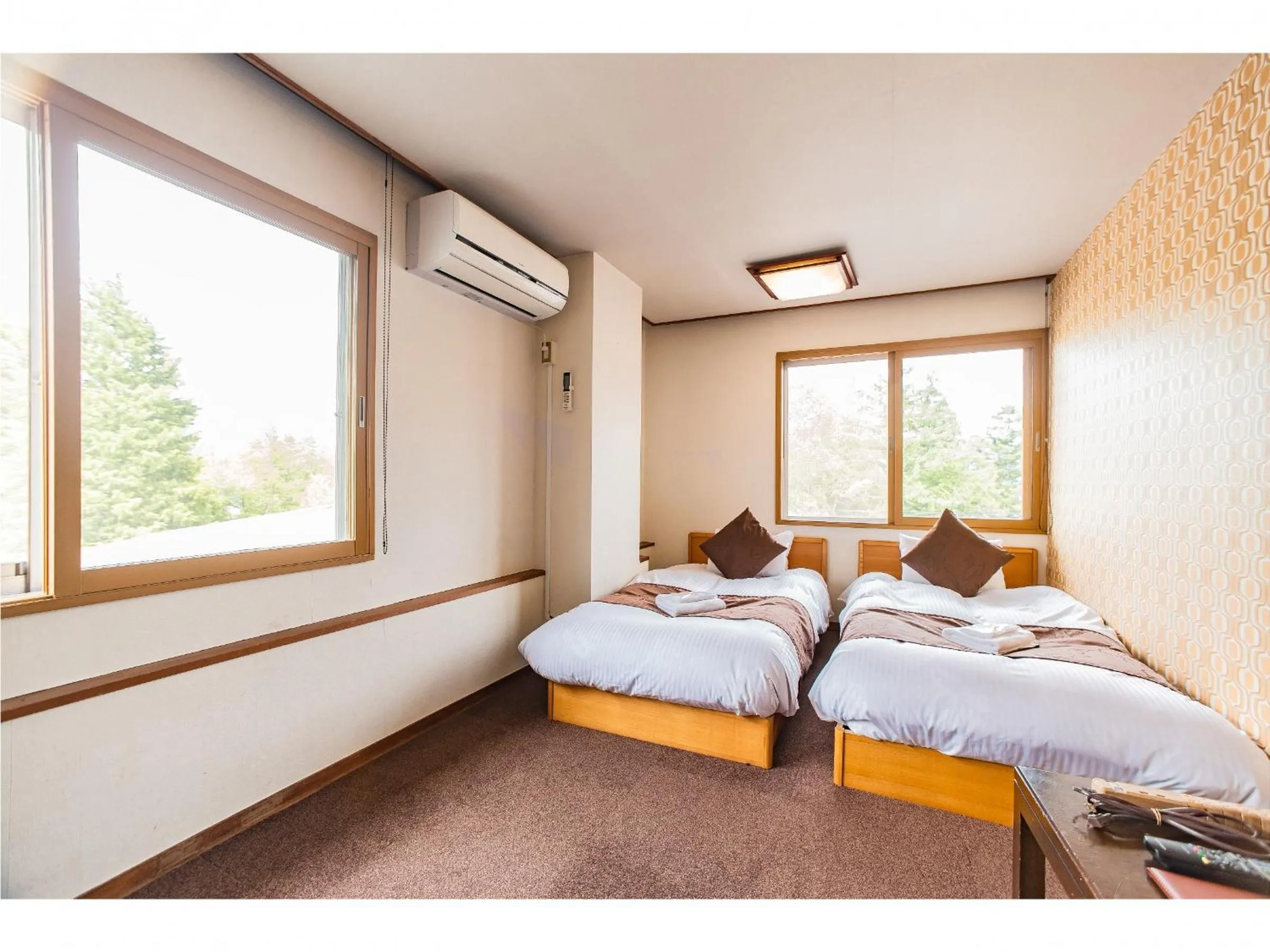 Photo of the whole room, Bed in Nomad Hakuba