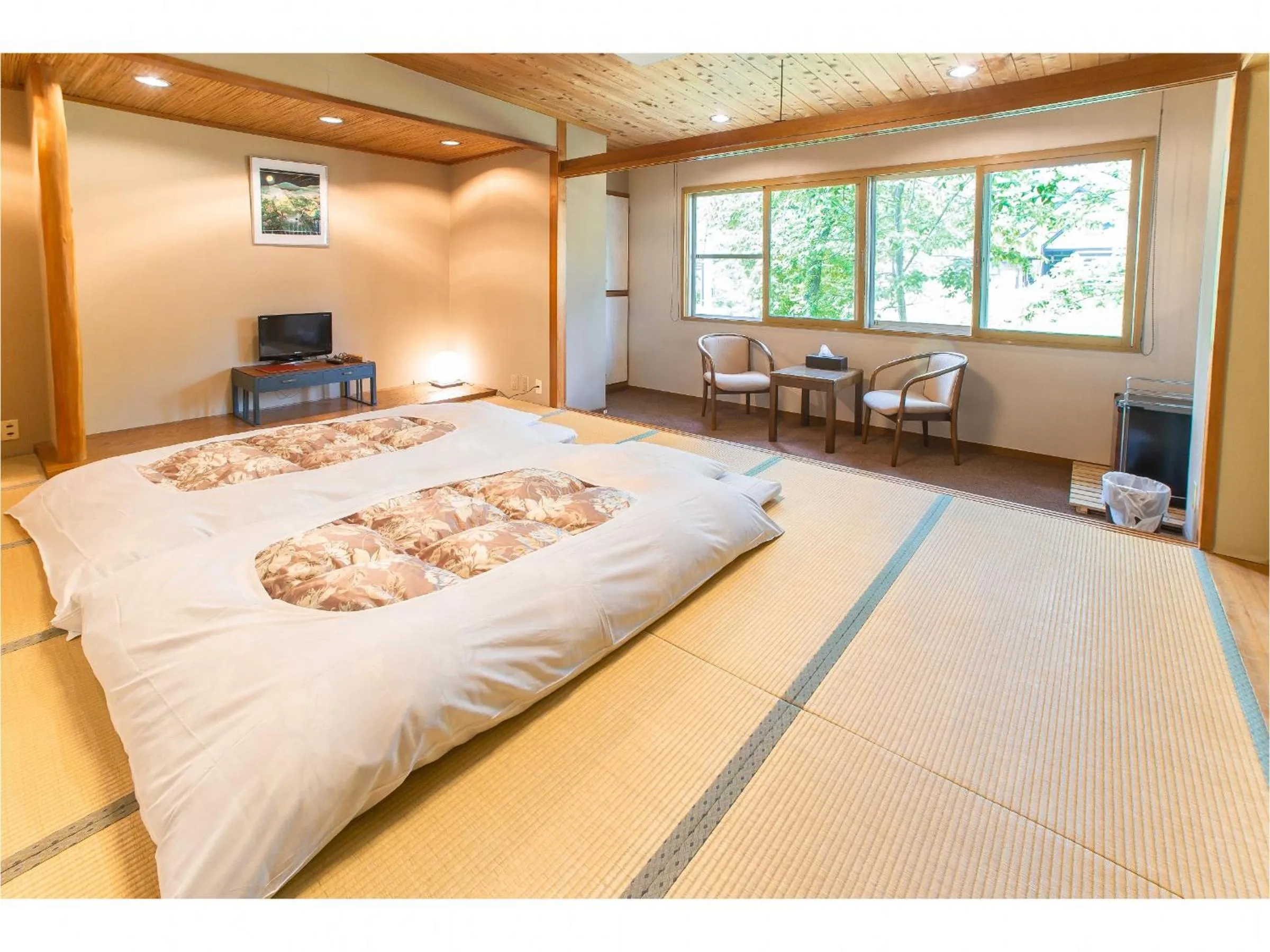 Photo of the whole room, Bed in Nomad Hakuba