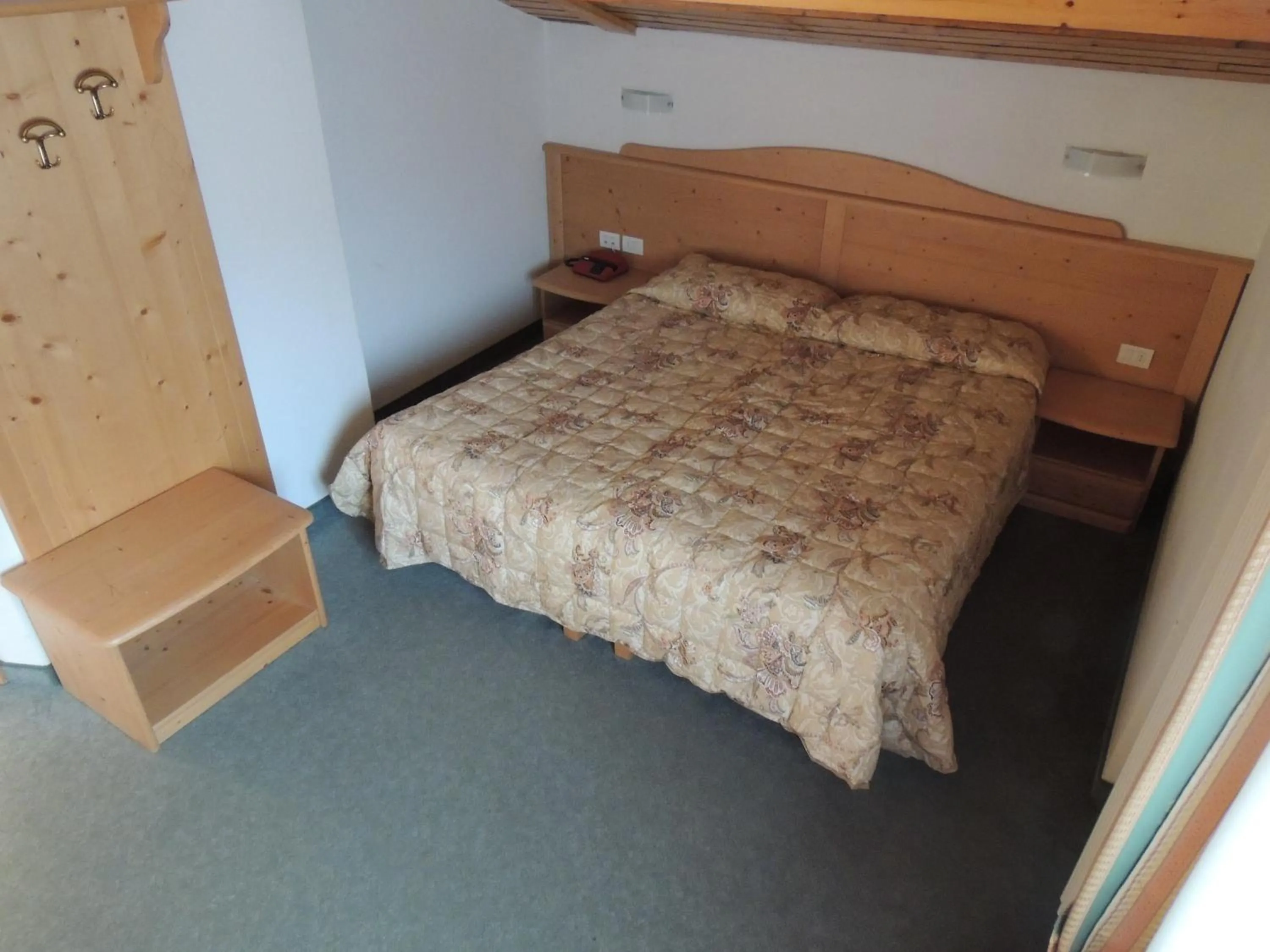 Bed in Liz Hotel & Apartments