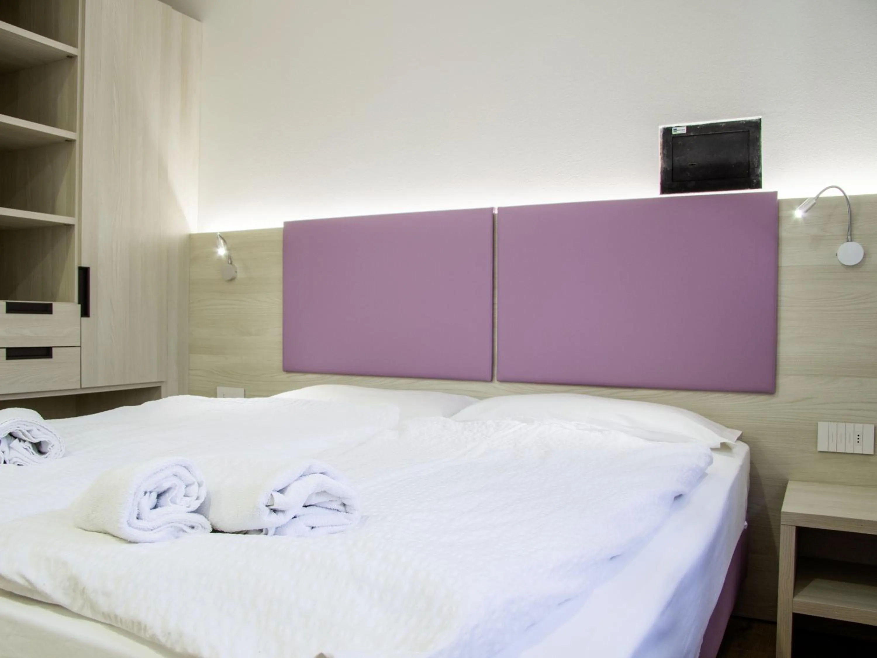 Bed in Liz Hotel & Apartments