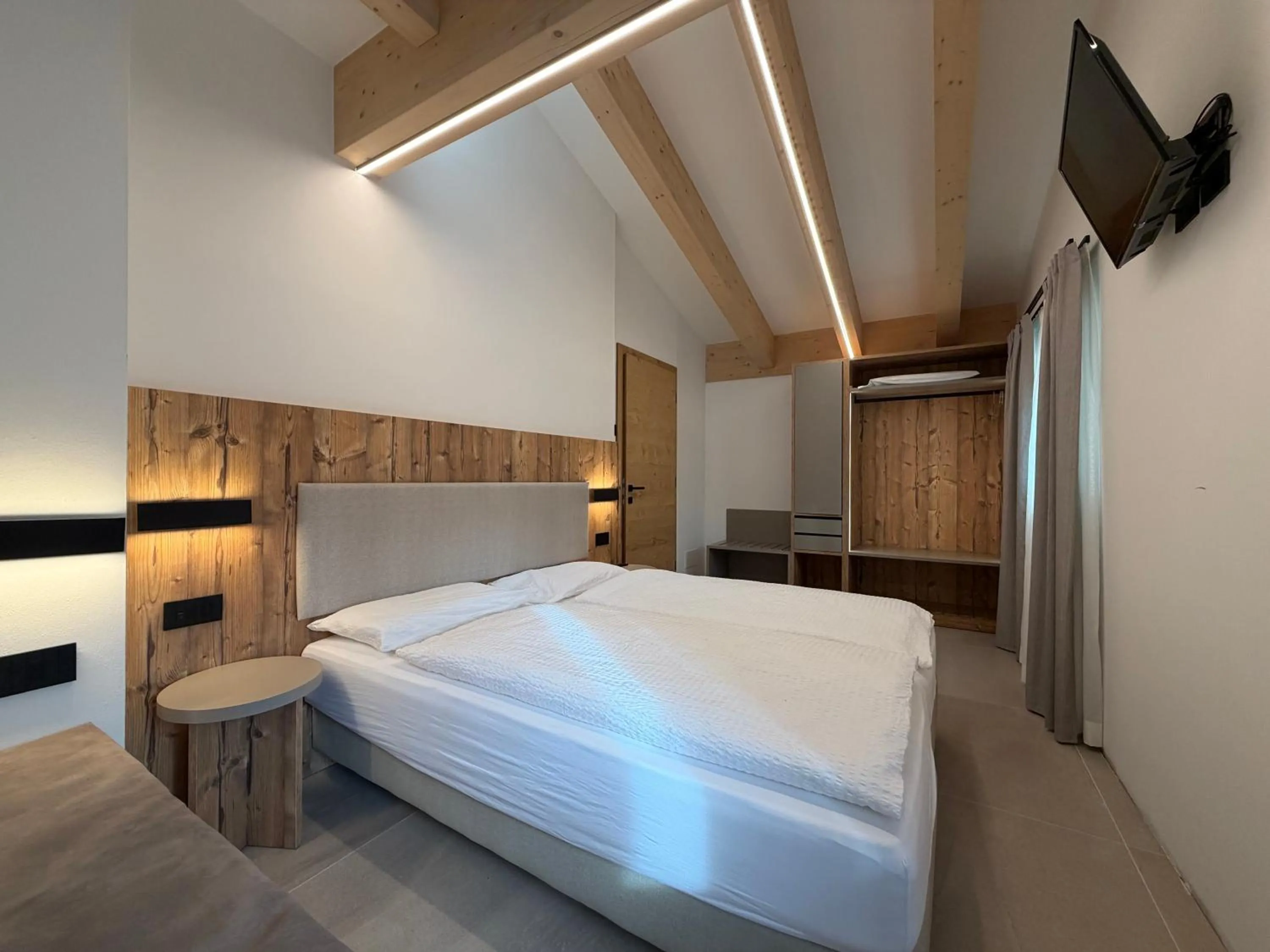 Bed in Liz Hotel & Apartments