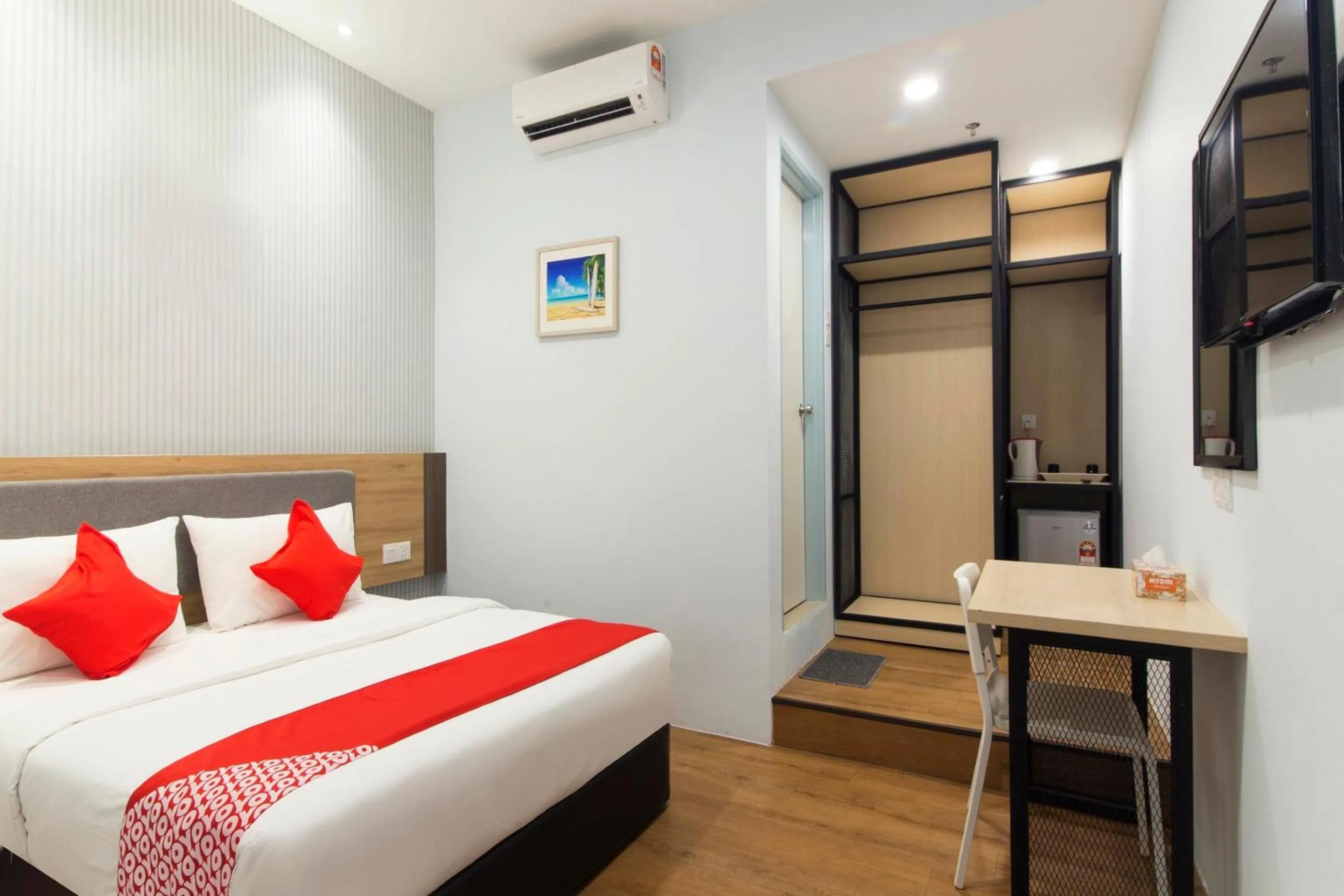 Communal lounge/ TV room, Bed in Agape Hotel Selayang