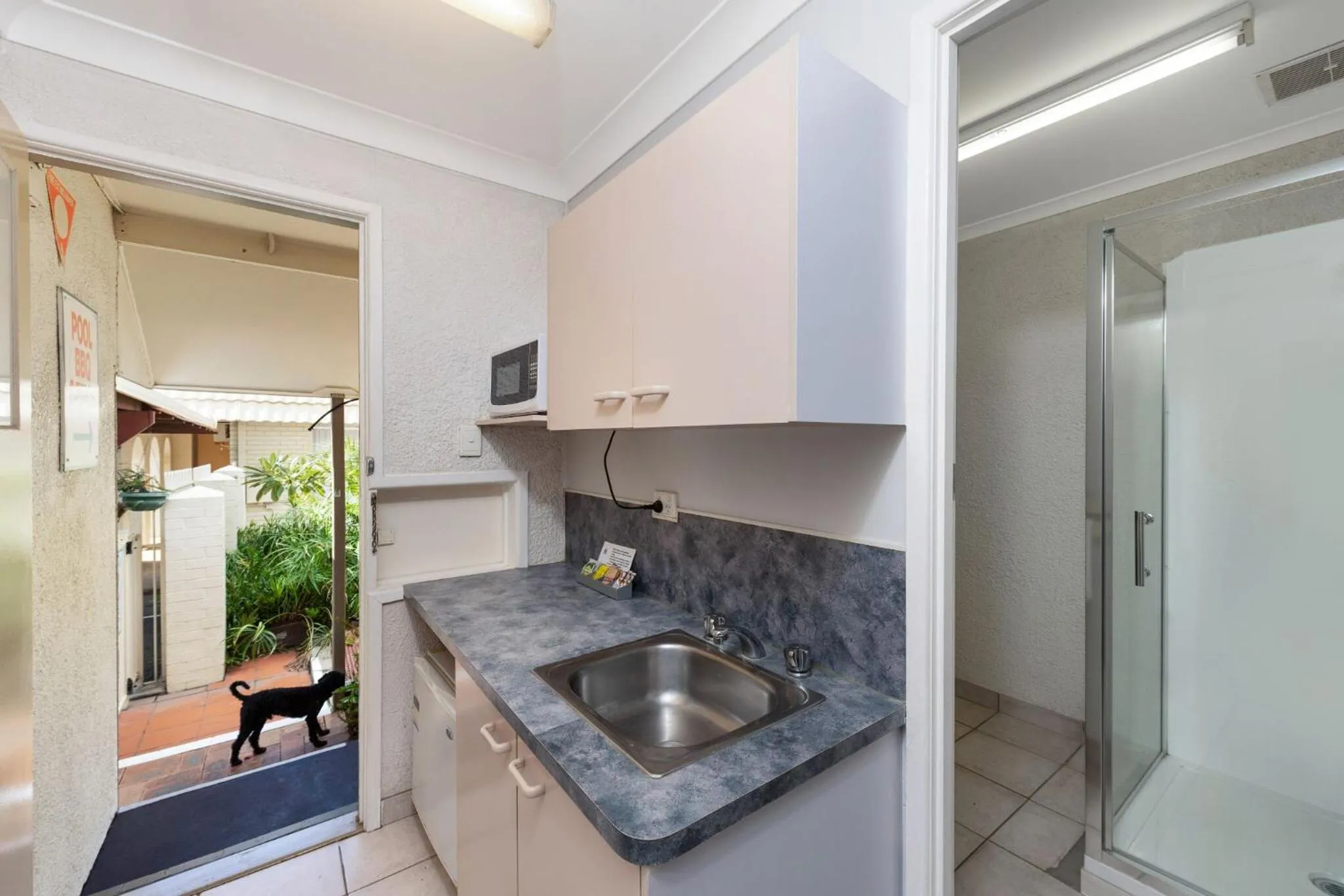 Kitchen or kitchenette in Bundaberg Coral Villa Motor Inn