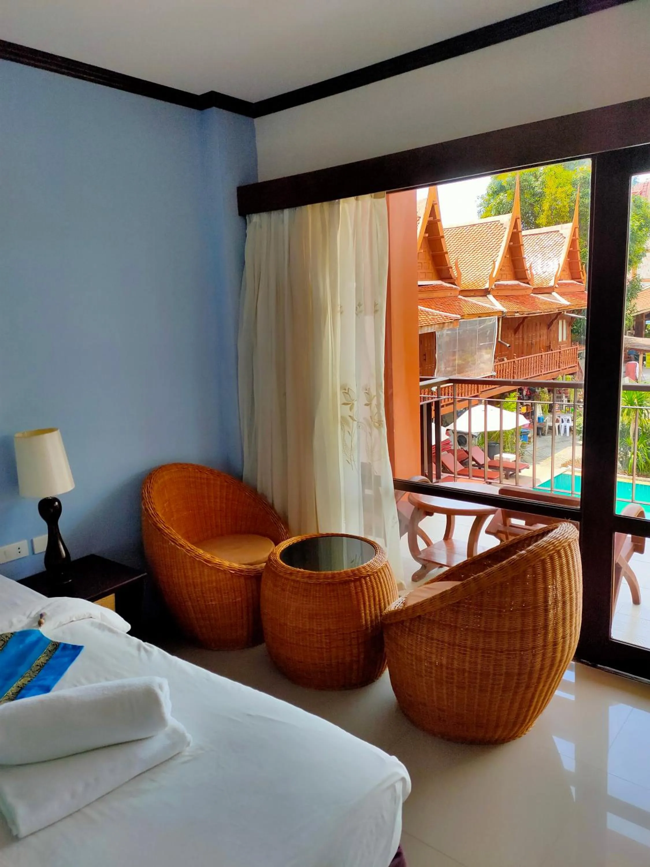 Seating area, Bed in Grand Thai House Resort Lamai