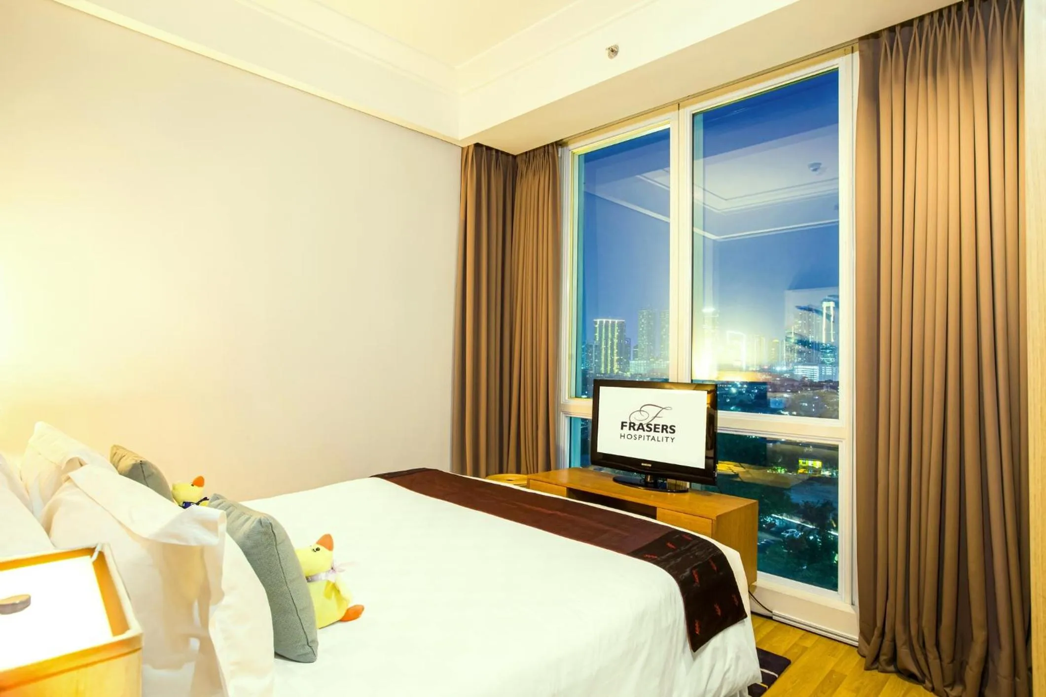 View (from property/room), Bed in Fraser Residence Sudirman Jakarta