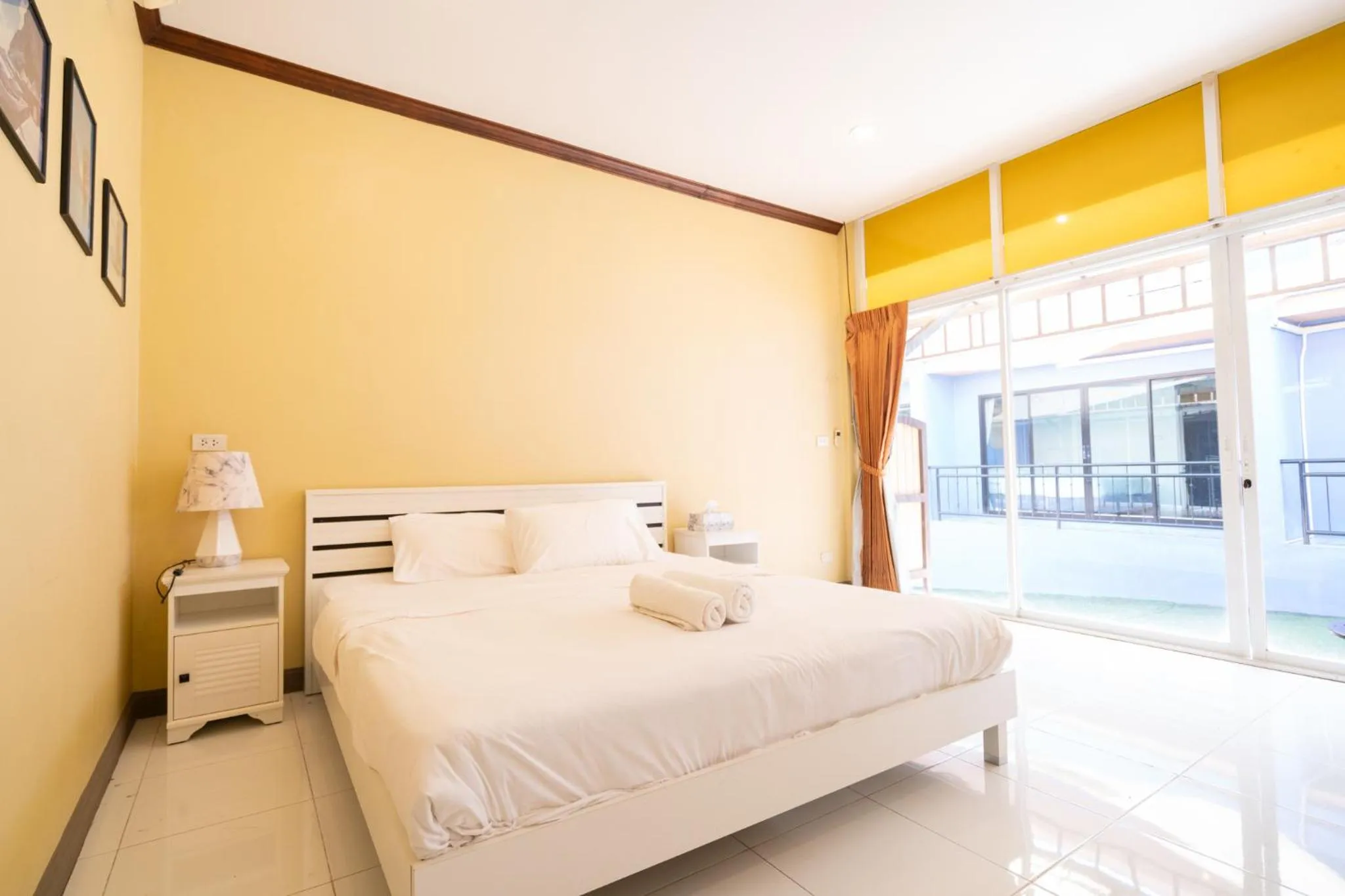 Bed in The Panwa Guesthouse, Phuket