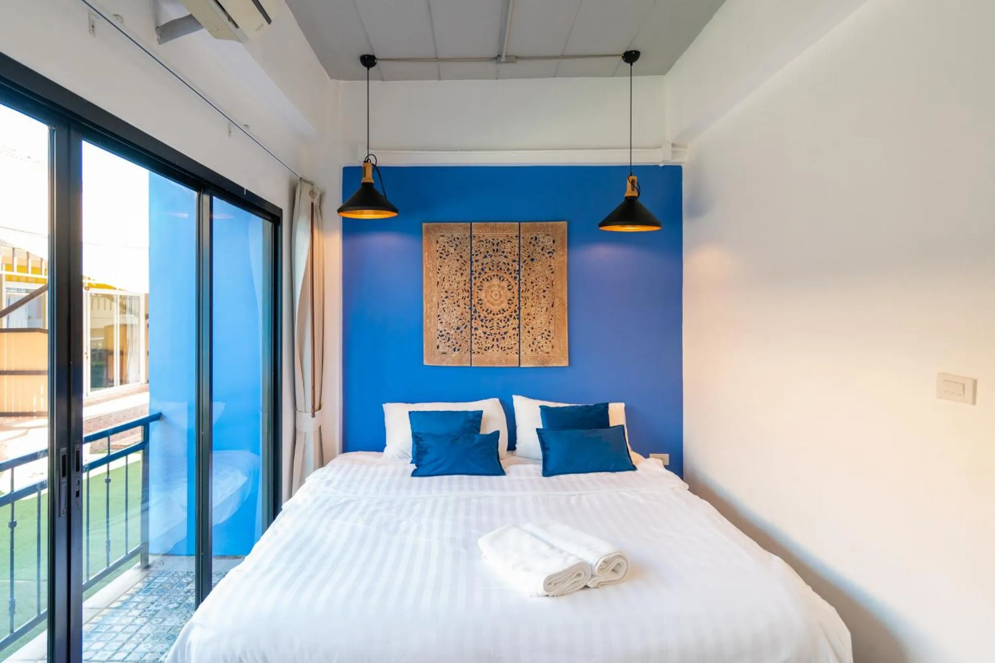 Bed in The Panwa Guesthouse, Phuket