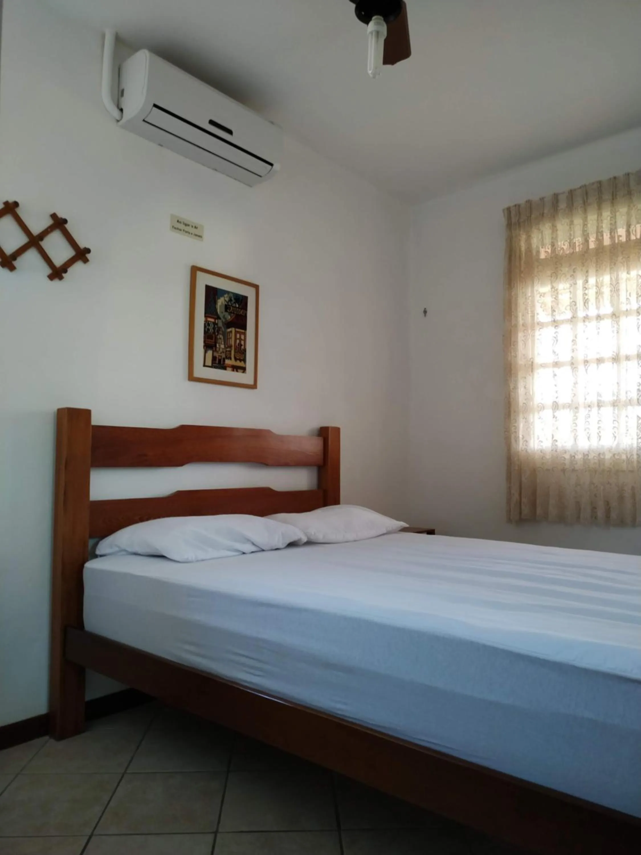 Bed in Residencial Praia Bombas