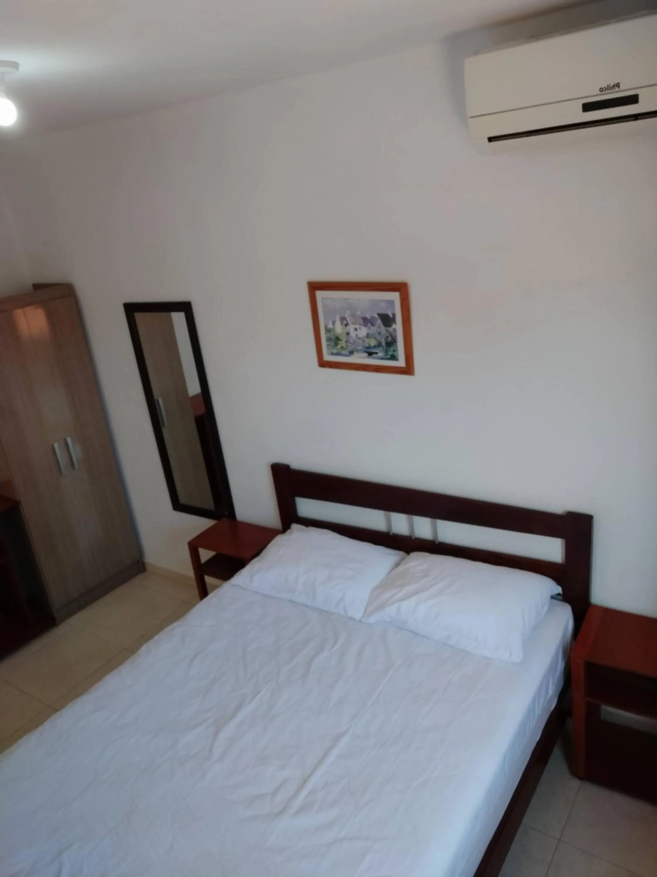 Bed in Residencial Praia Bombas