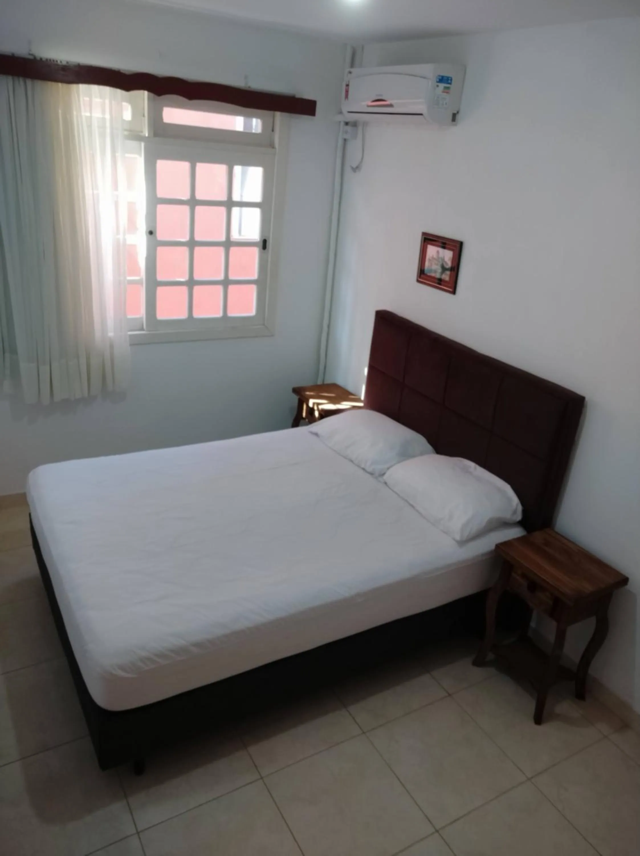 Bed in Residencial Praia Bombas