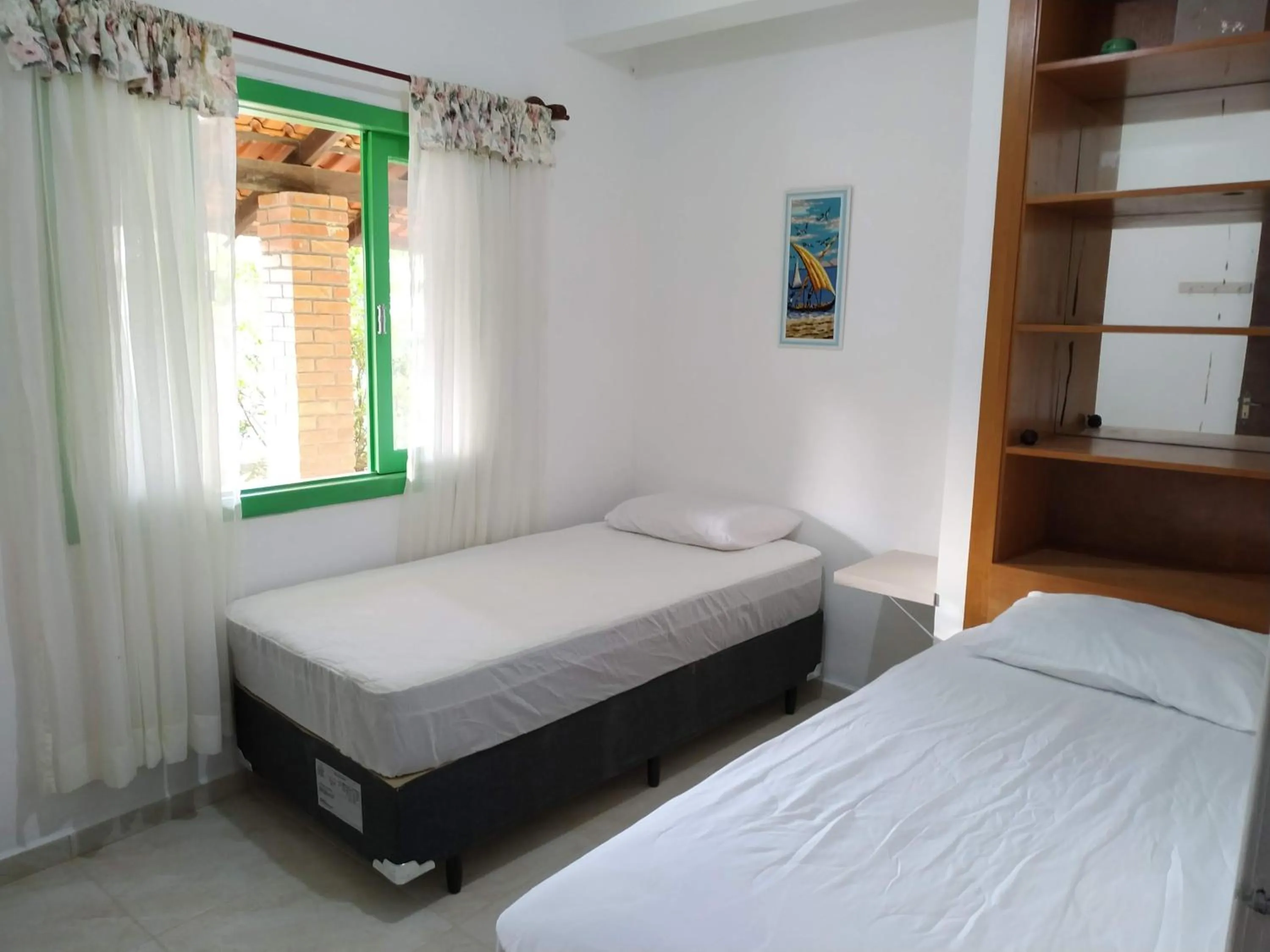 Bed in Residencial Praia Bombas