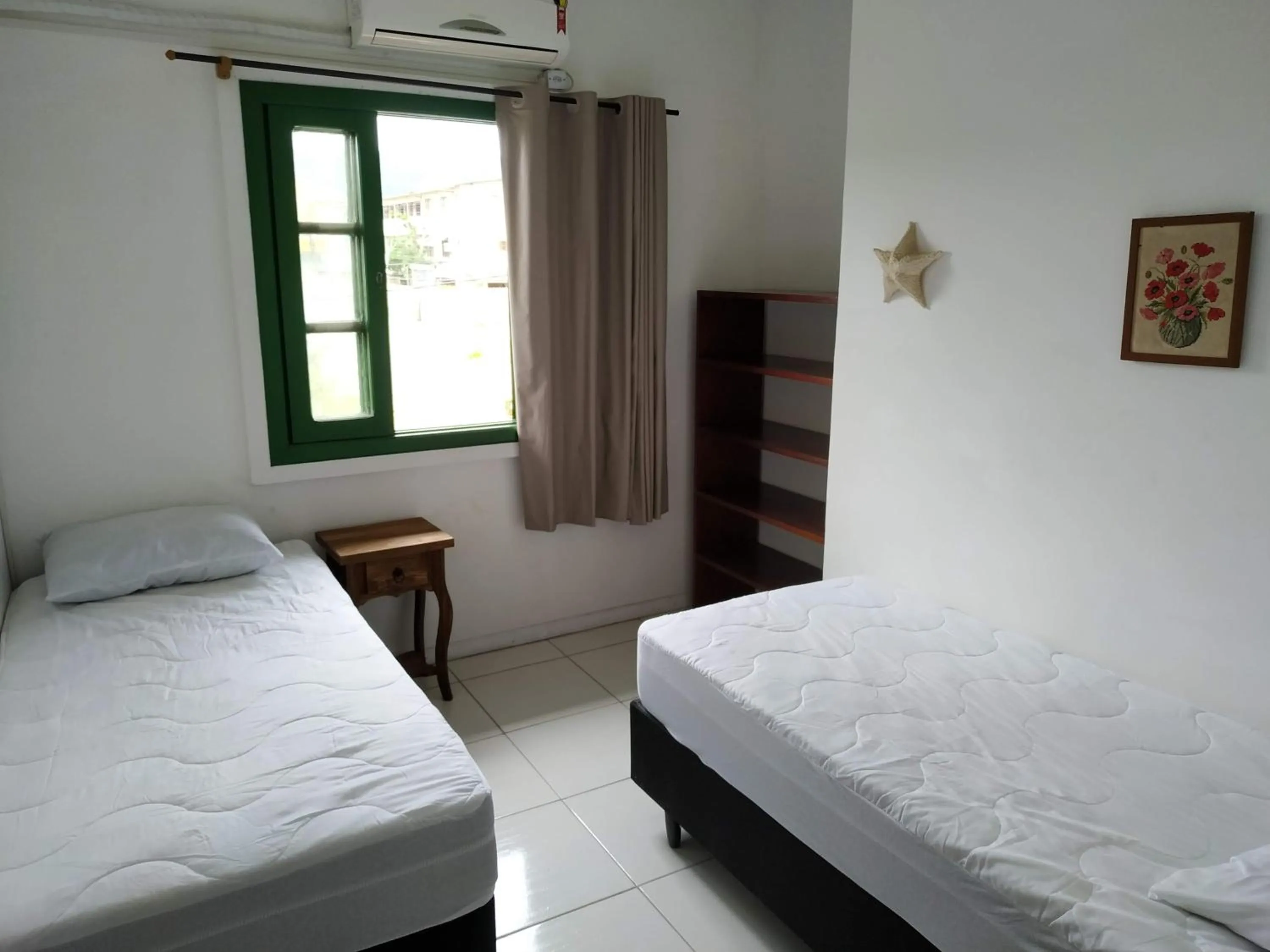 Bed in Residencial Praia Bombas