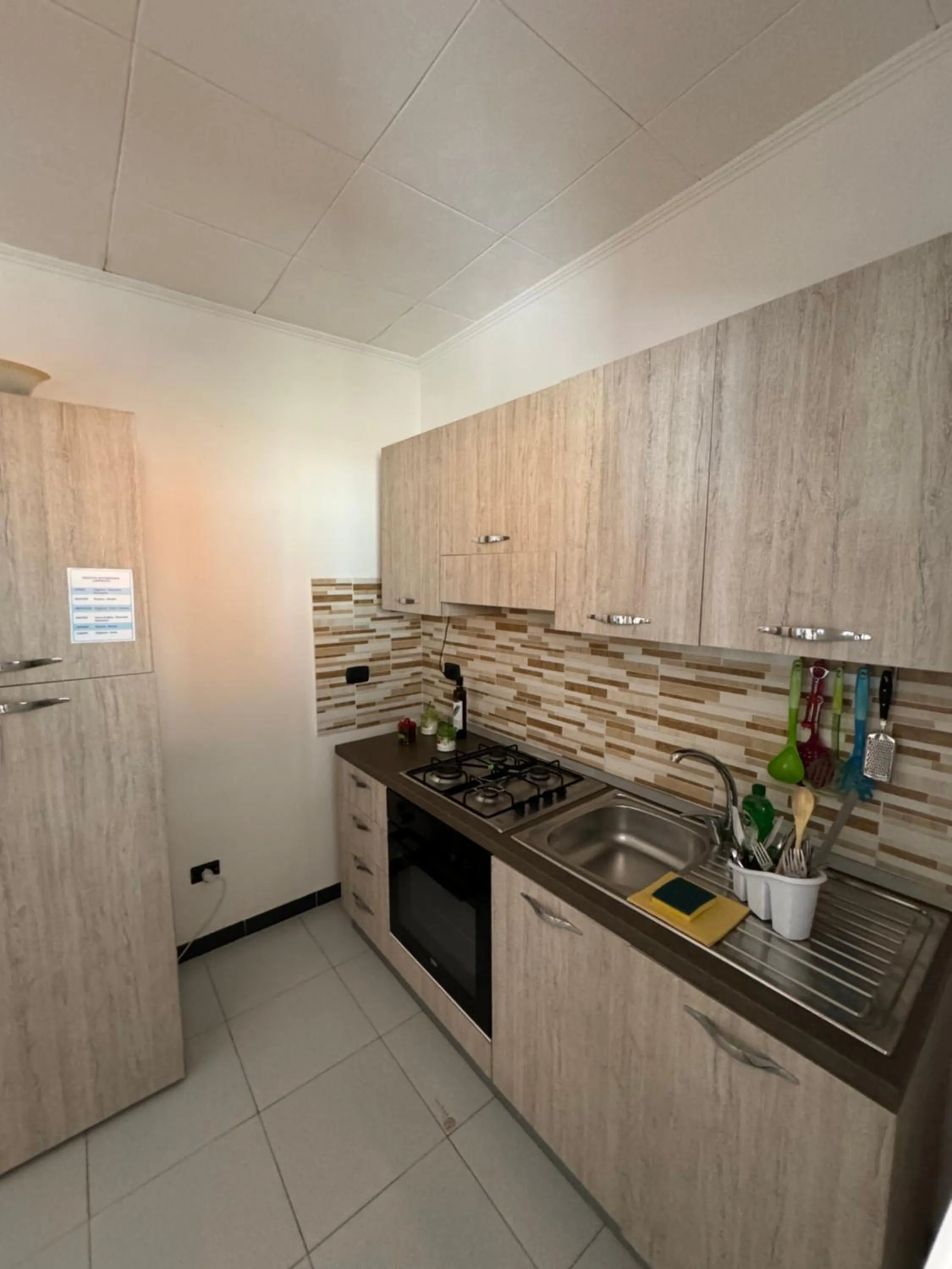 Kitchen or kitchenette in Residence La Conchiglia