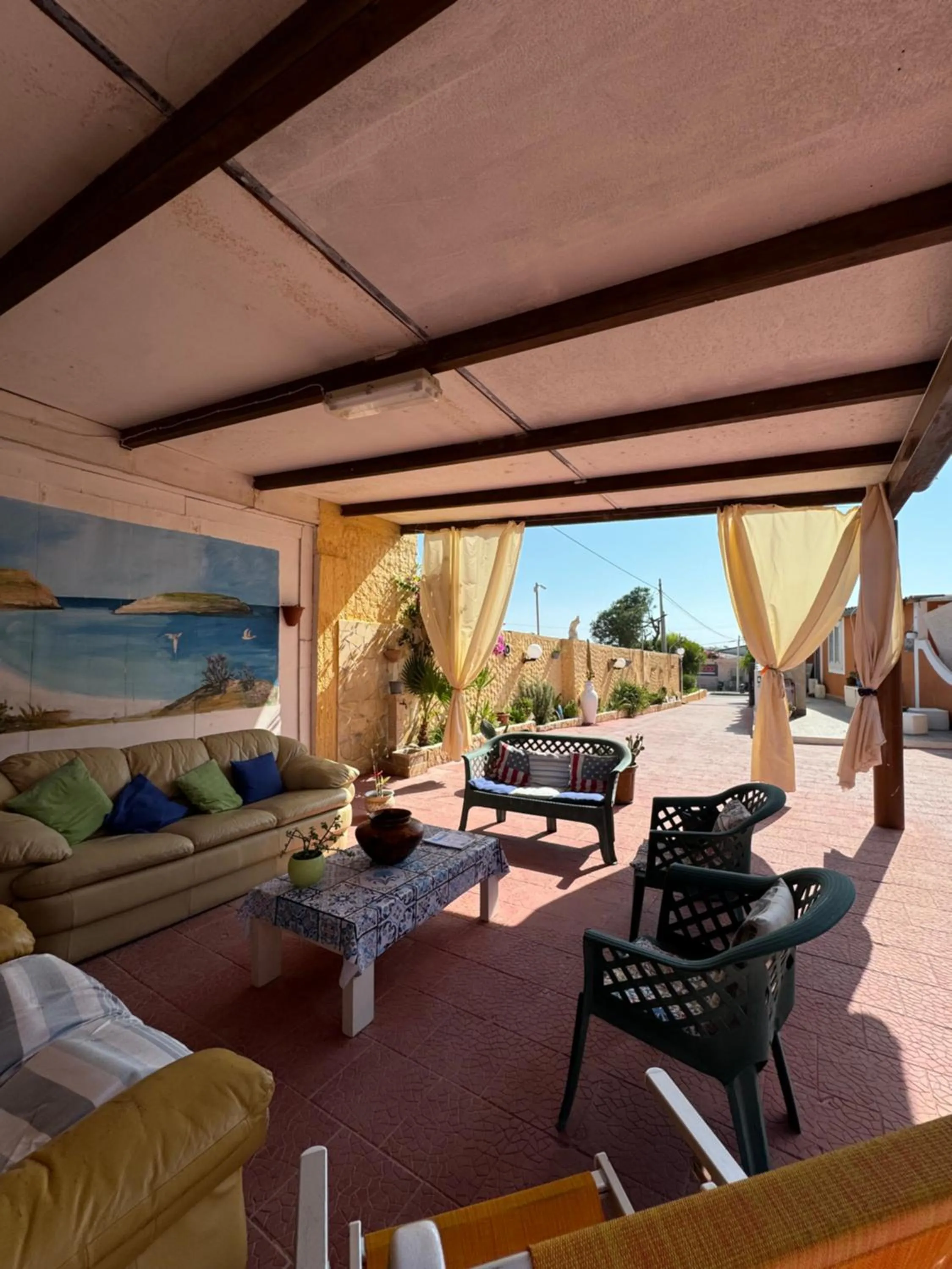 Communal lounge/ TV room in Residence La Conchiglia