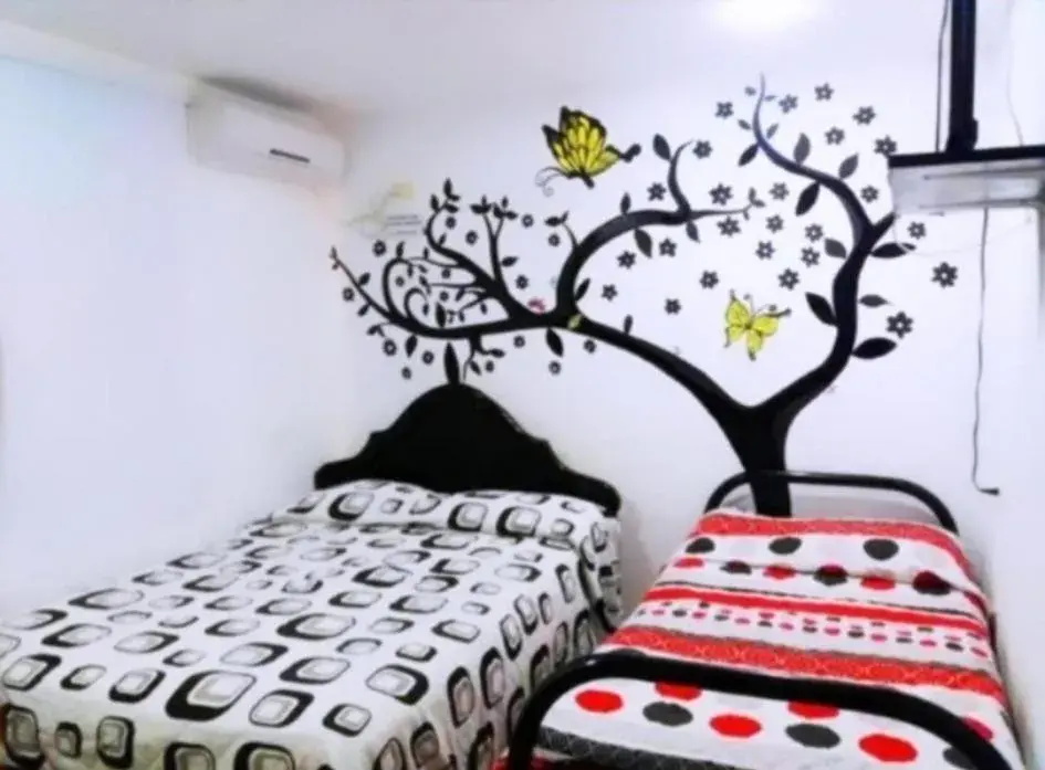 Triple Room with Private External Bathroom in Casa Turística Realismo Mágico Triple Room with Private External Bathroom in Casa Turística Realismo Mágico