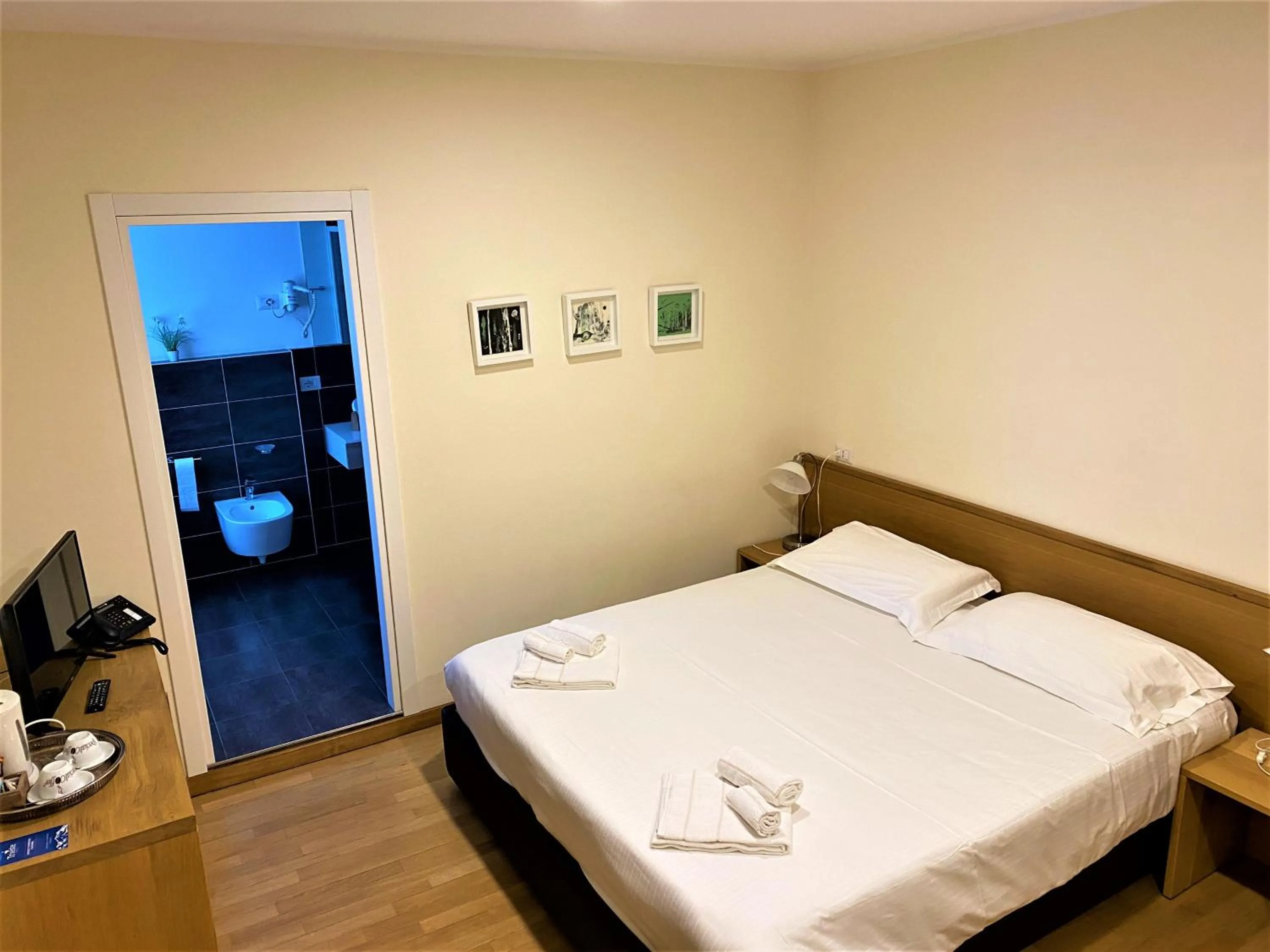 Bed in Hotel Trieste