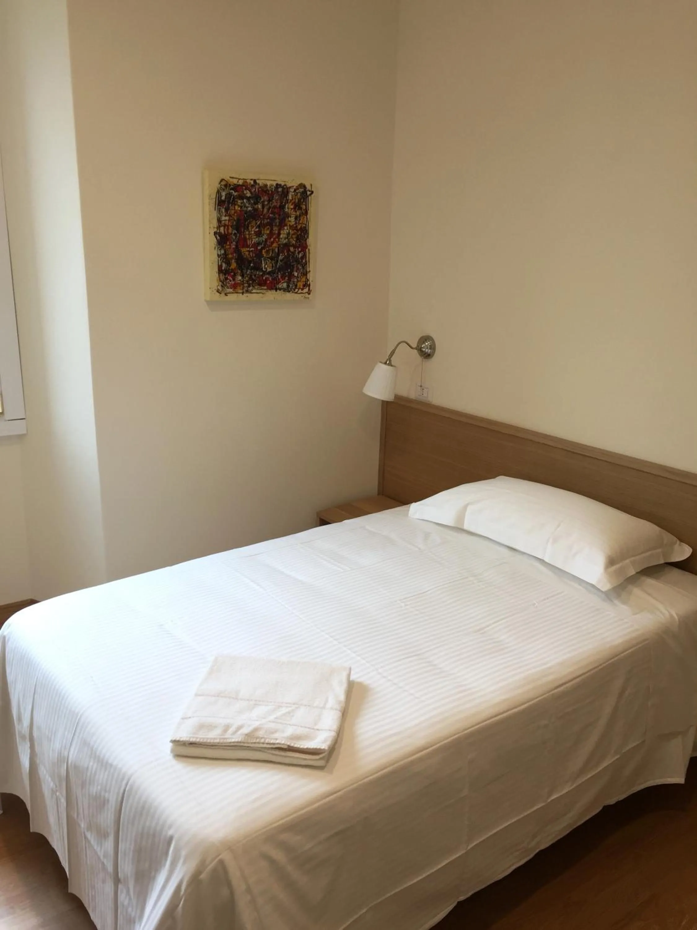 Bed in Hotel Trieste