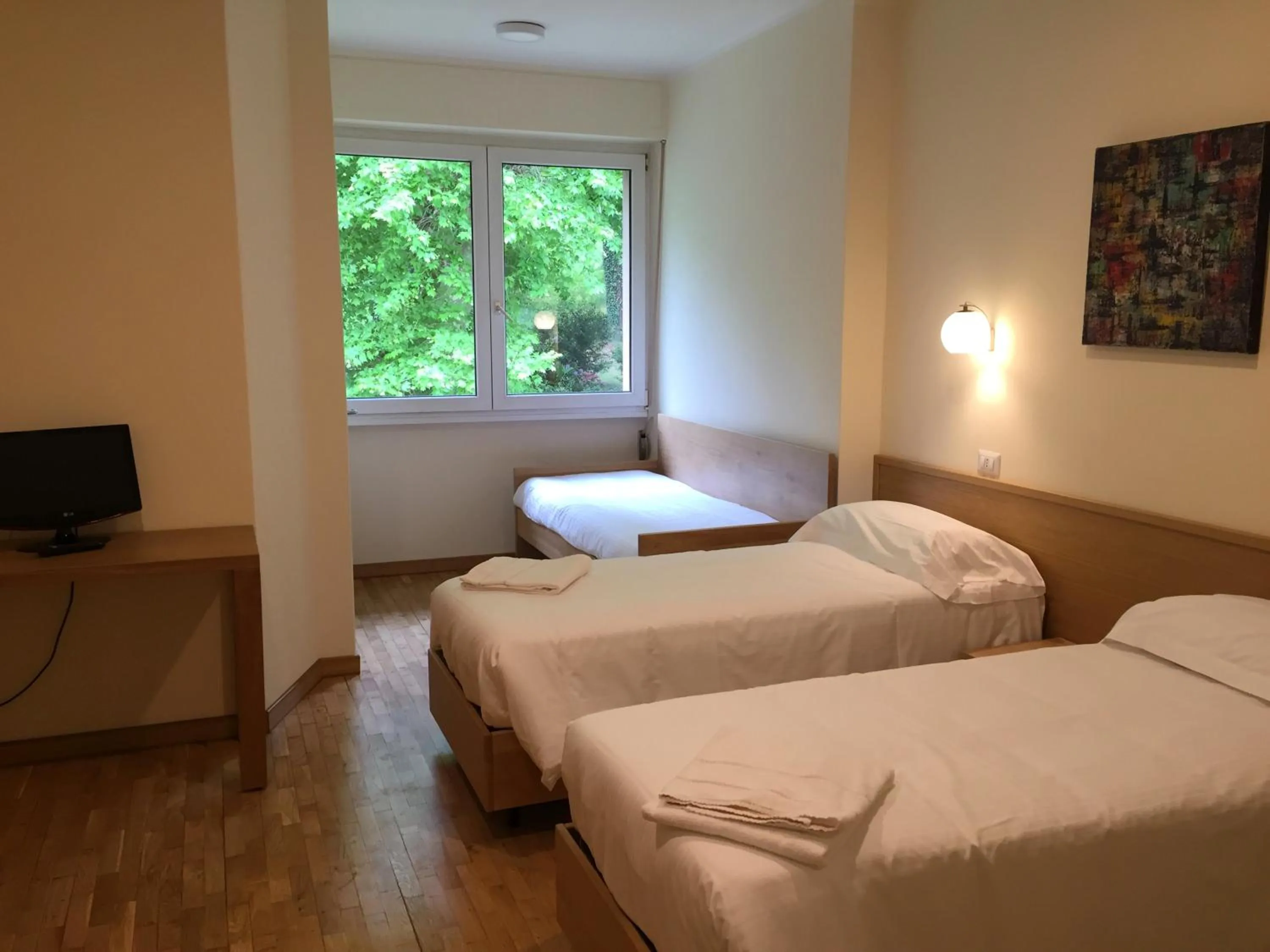 Photo of the whole room, Bed in Hotel Trieste