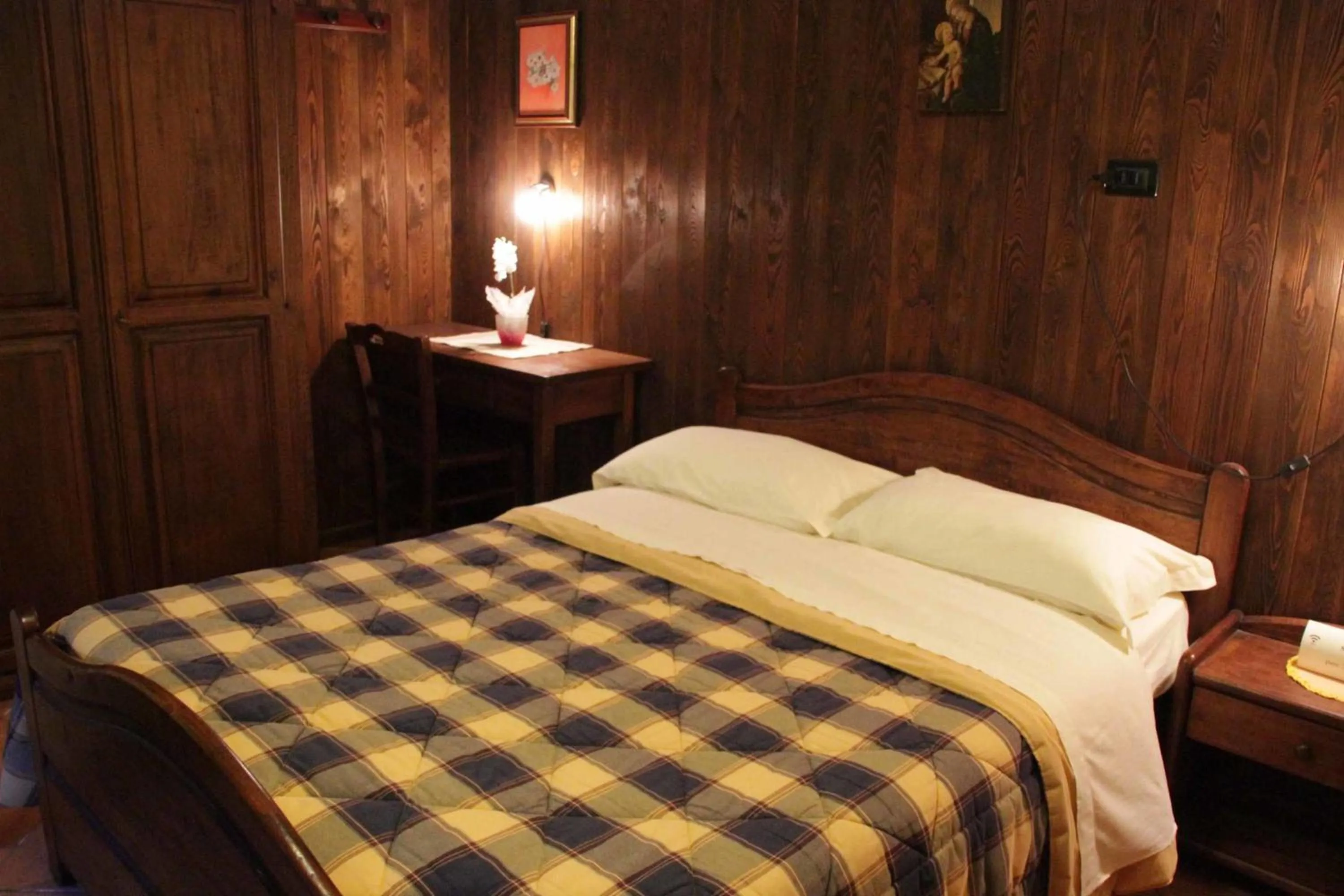 Bed in Chambres D'Hotes Les Fleurs