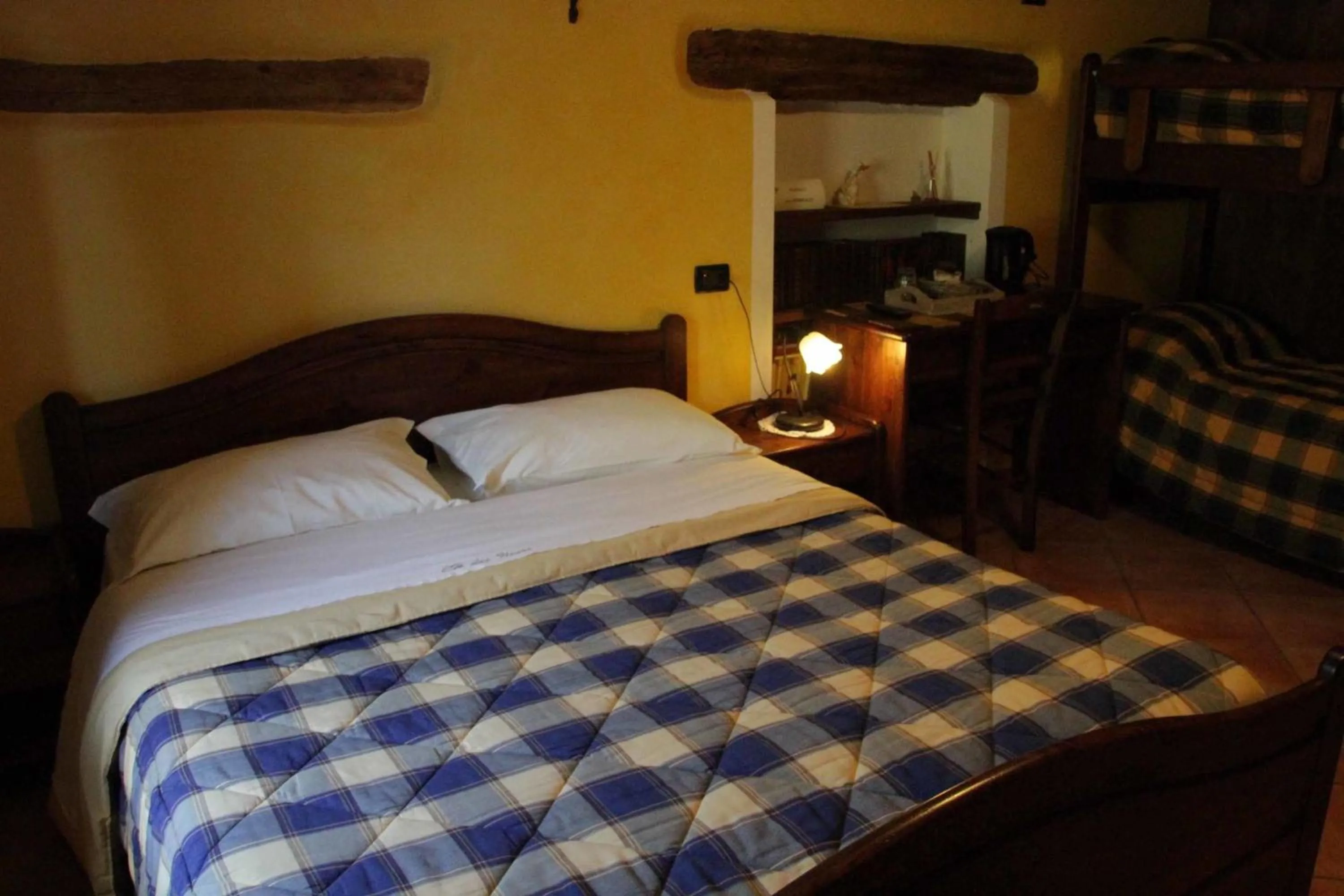 Bed in Chambres D'Hotes Les Fleurs