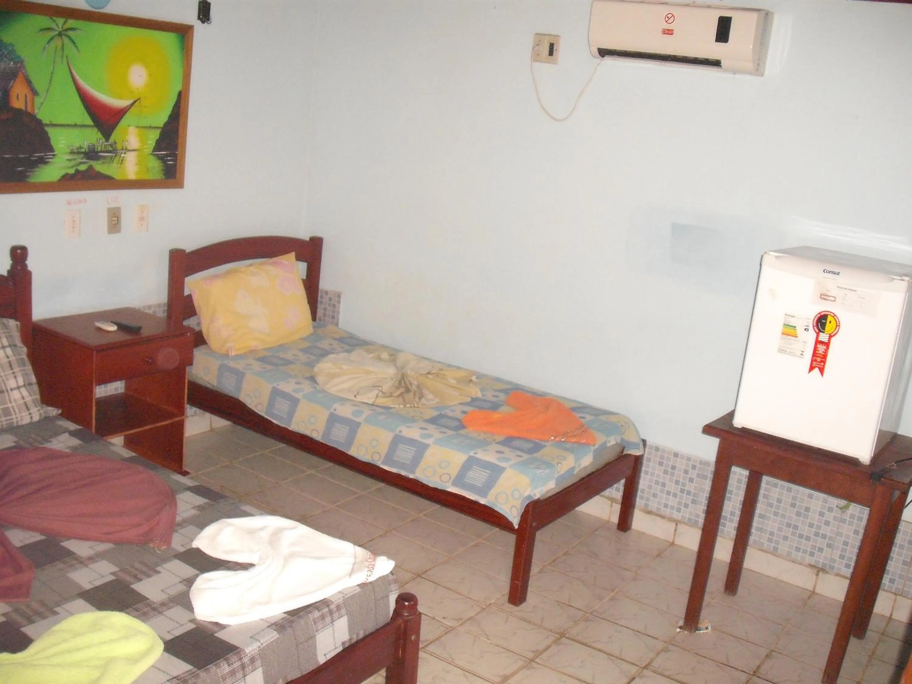 Photo of the whole room, Bed in Pousada Chalé Suiço