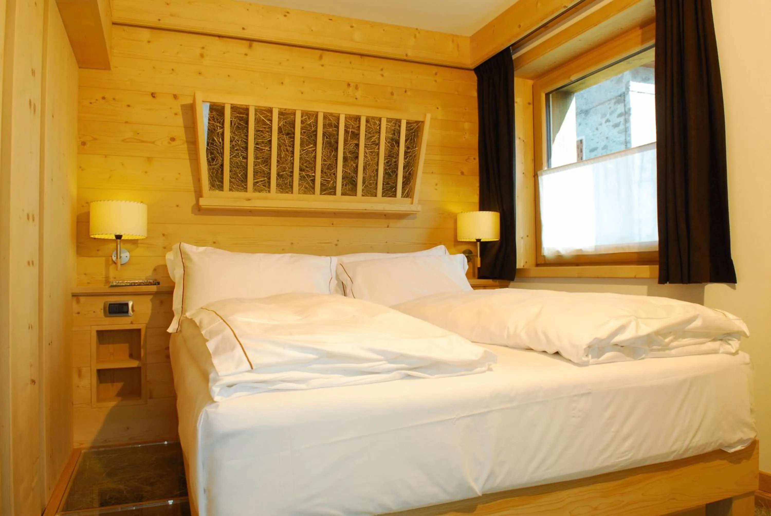 Bed in Alpen Hotel Chalet