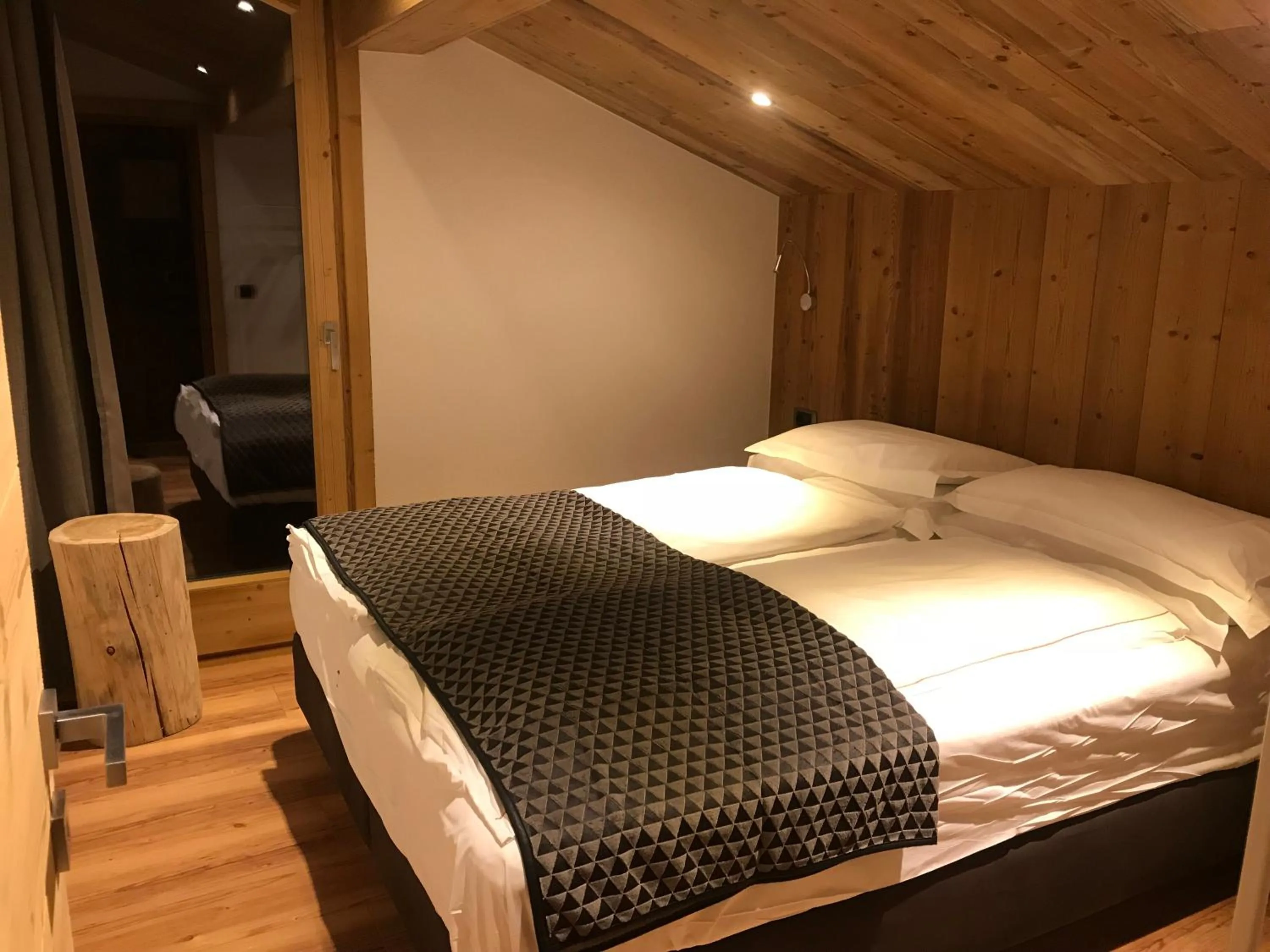 Photo of the whole room, Bed in Alpen Hotel Chalet