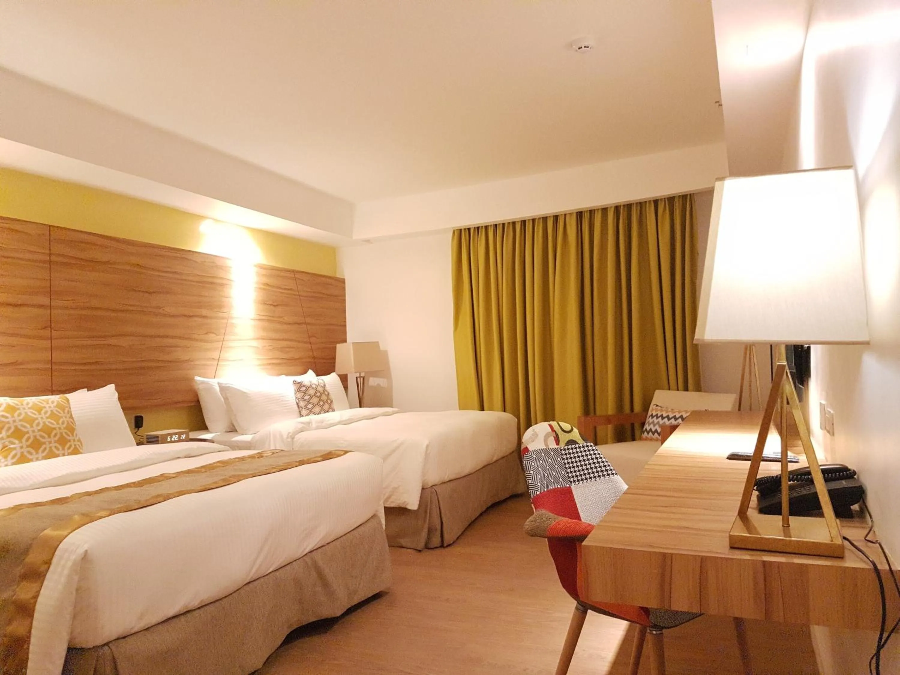 Bed in Ferra Hotel and Garden Suites