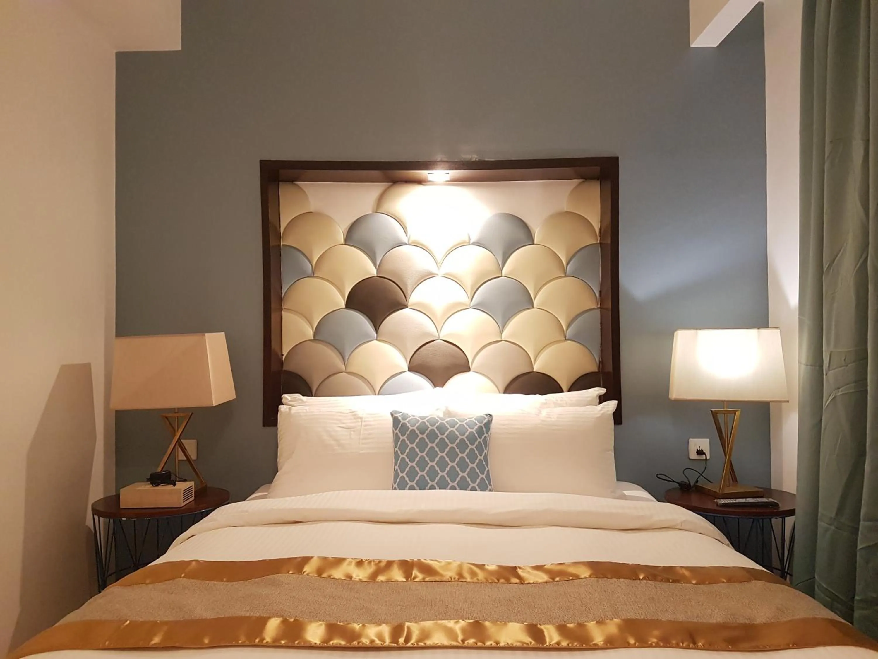 Bed in Ferra Hotel and Garden Suites