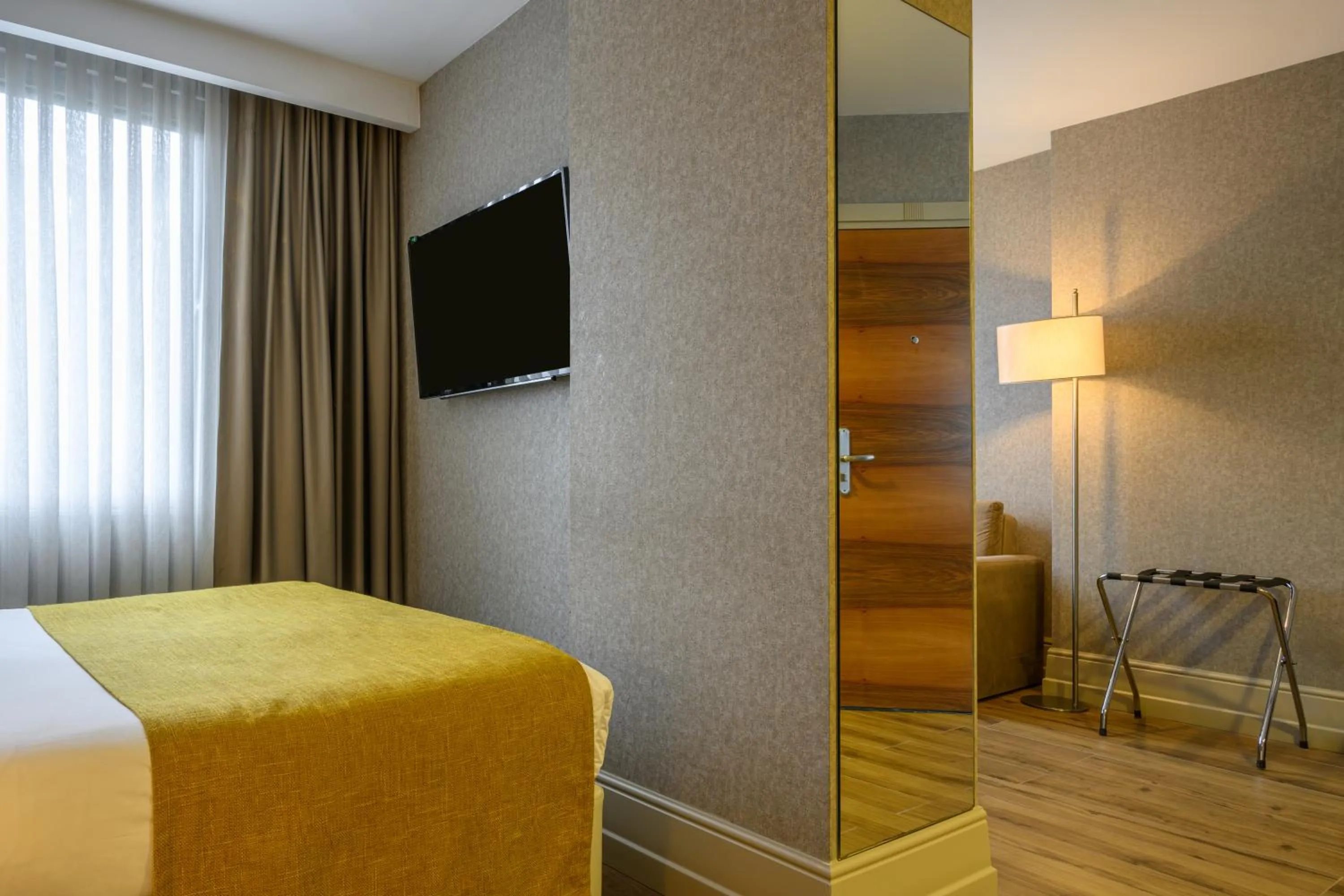 Bed in Ramada by Wyndham Istanbul Grand Bazaar