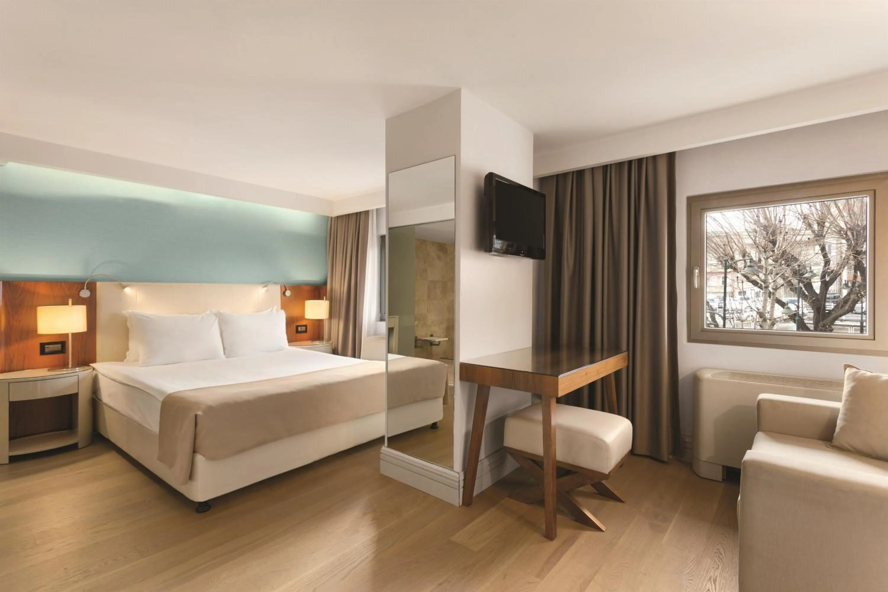 Communal lounge/ TV room, Bed in Ramada by Wyndham Istanbul Grand Bazaar