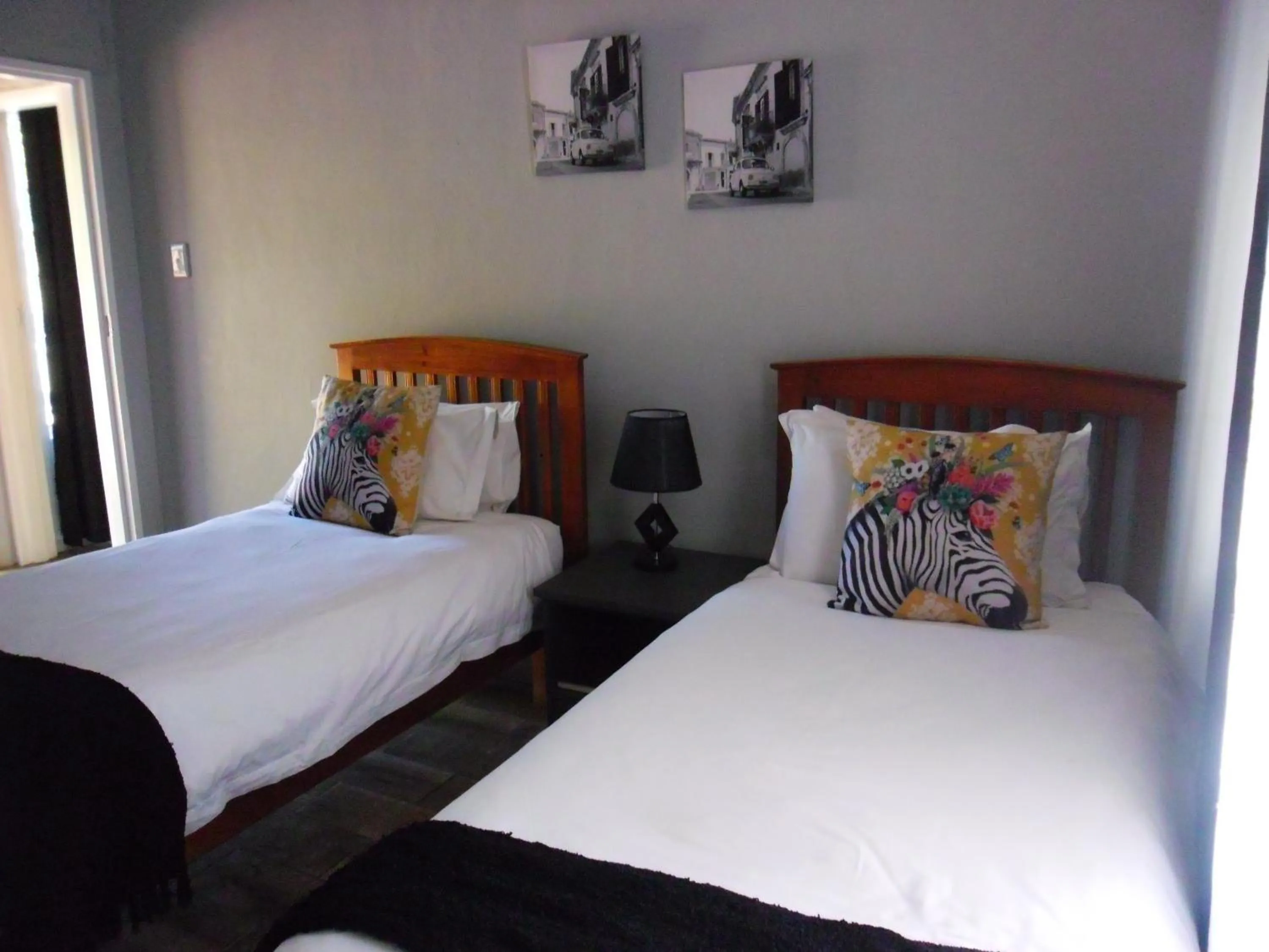 Bed in Merino Inn Hotel