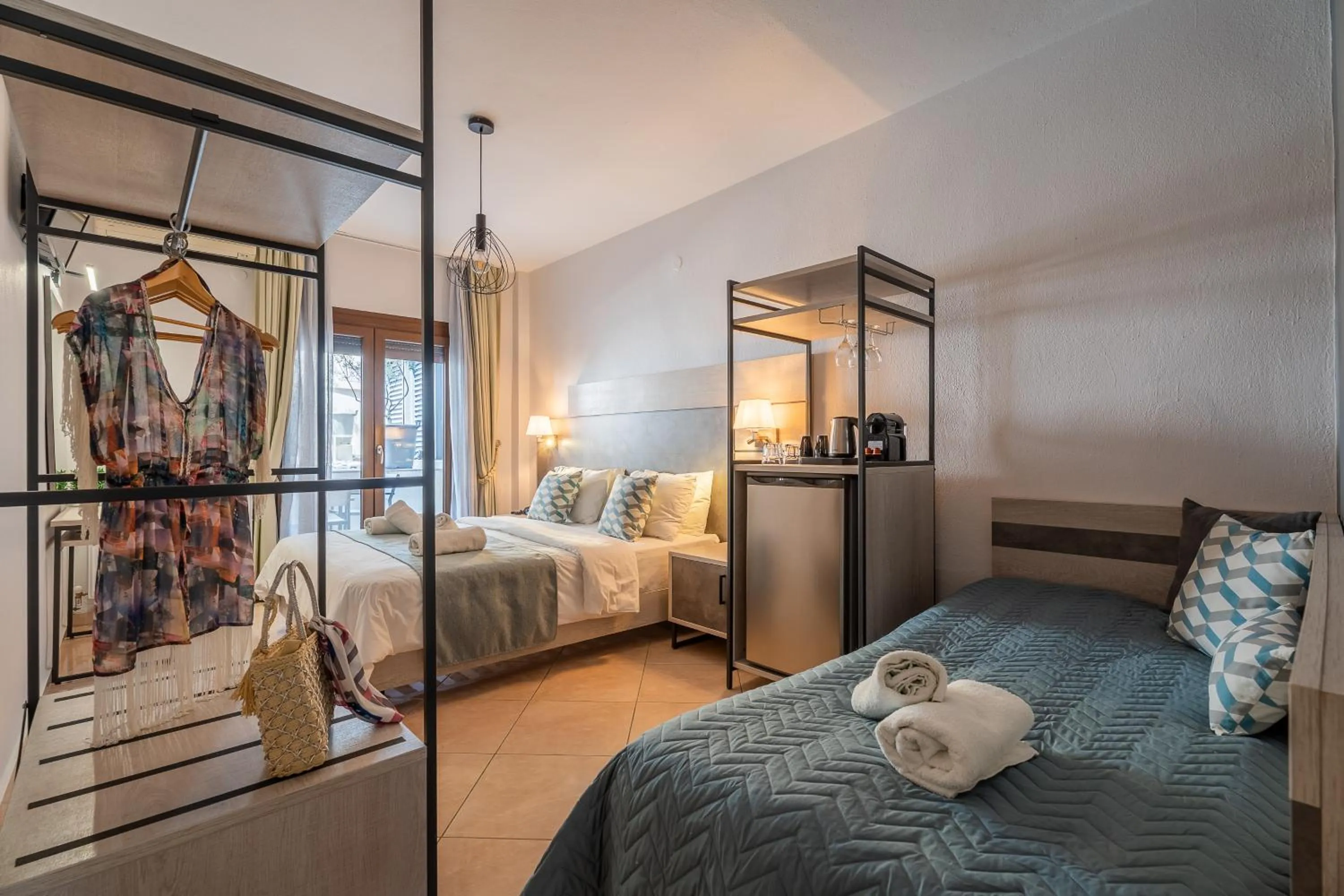 Bed in Meliton Inn Hotel & Suites by the beach