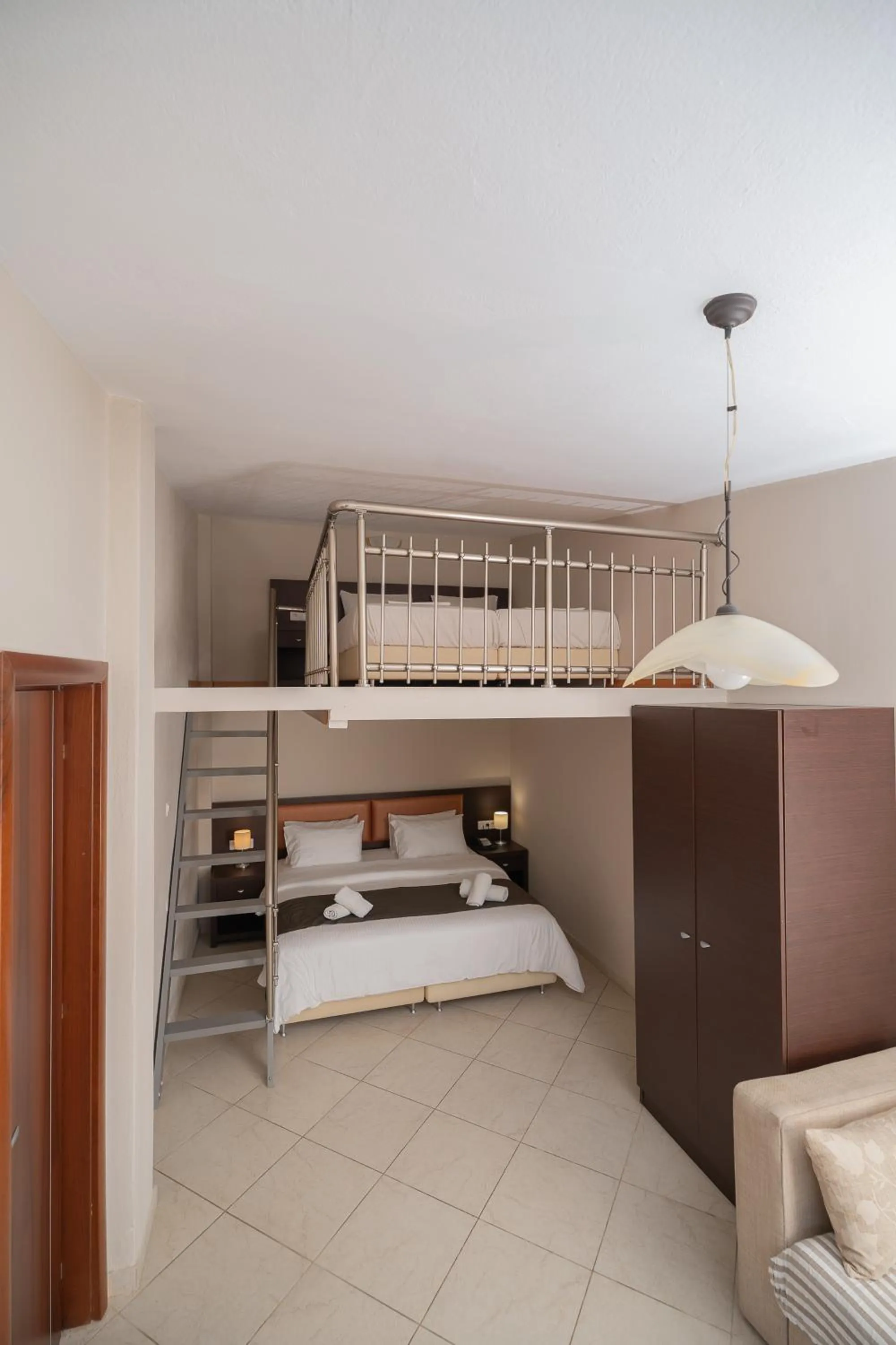 Bed in Meliton Inn Hotel & Suites by the beach