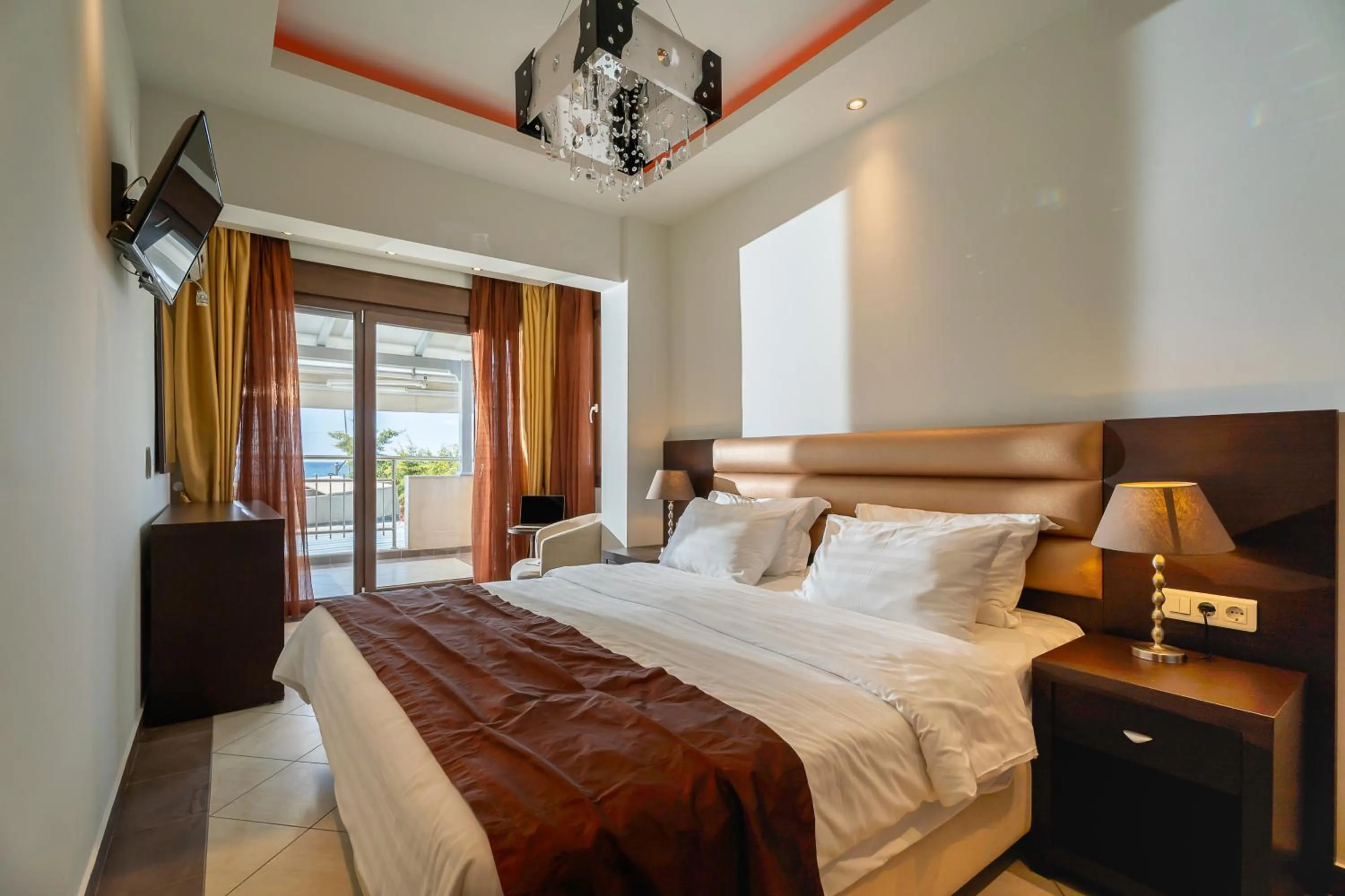 Bed in Meliton Inn Hotel & Suites by the beach