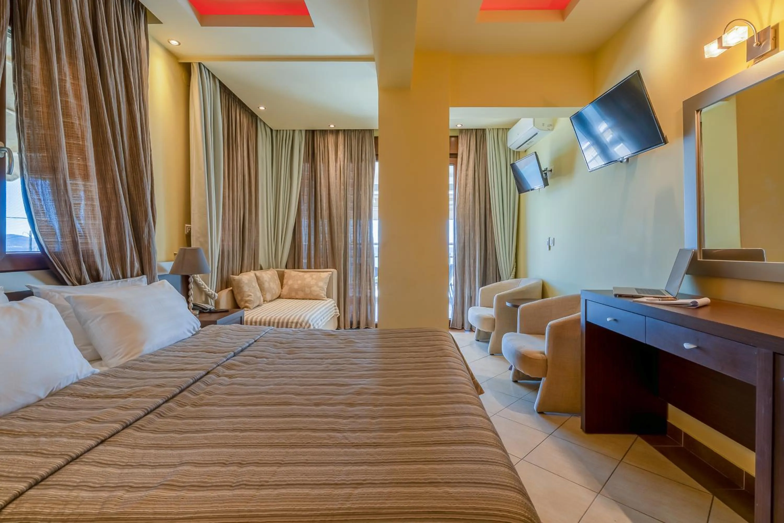 Bed in Meliton Inn Hotel & Suites by the beach