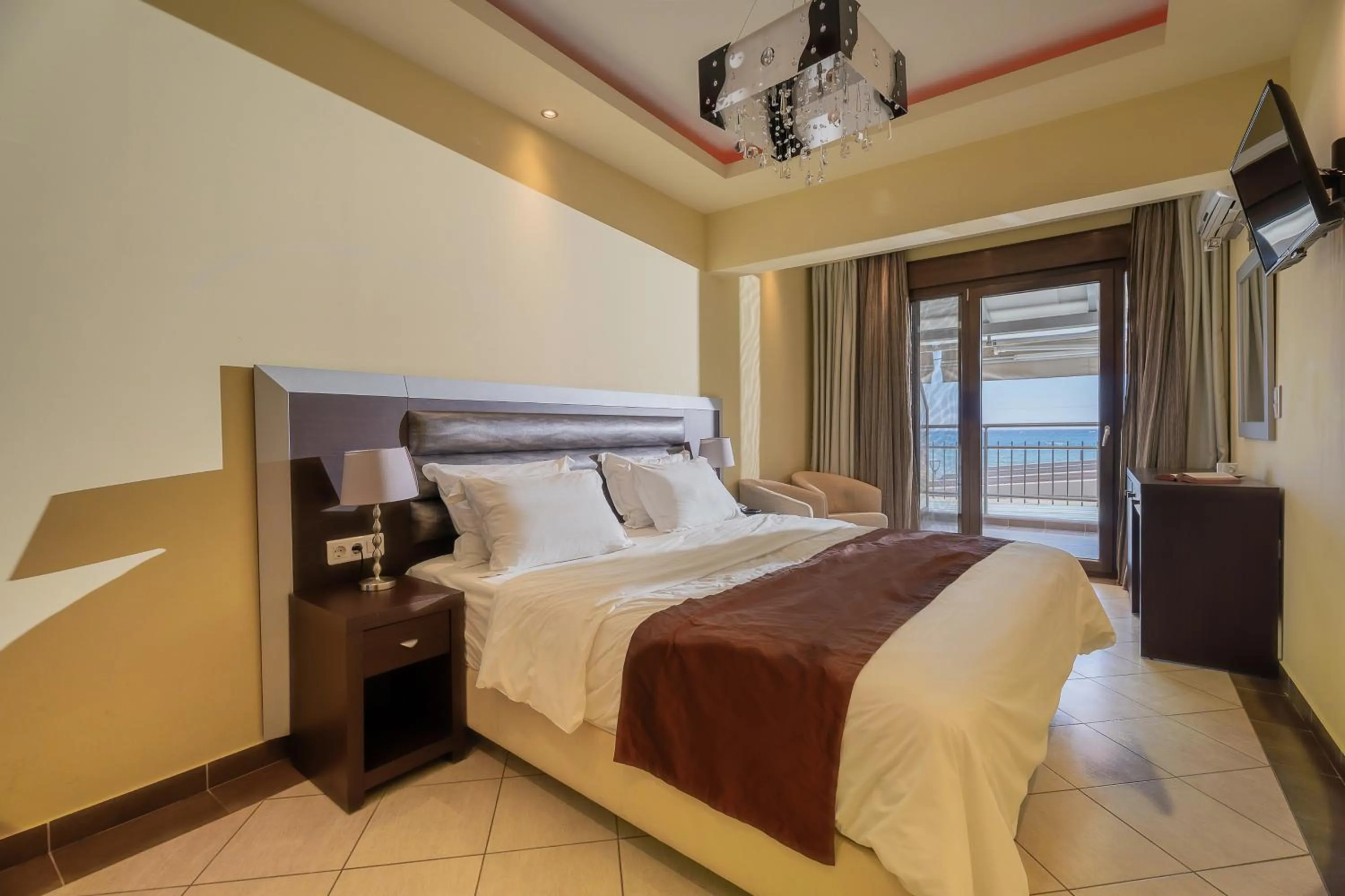 Bed in Meliton Inn Hotel & Suites by the beach