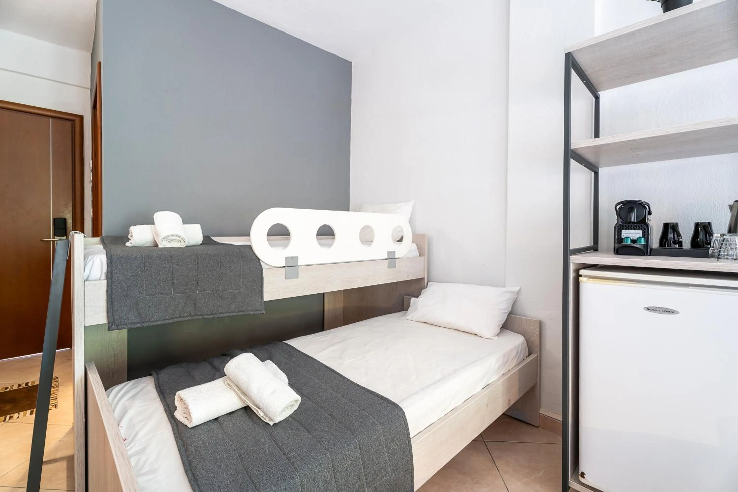 Bed in Meliton Inn Hotel & Suites by the beach