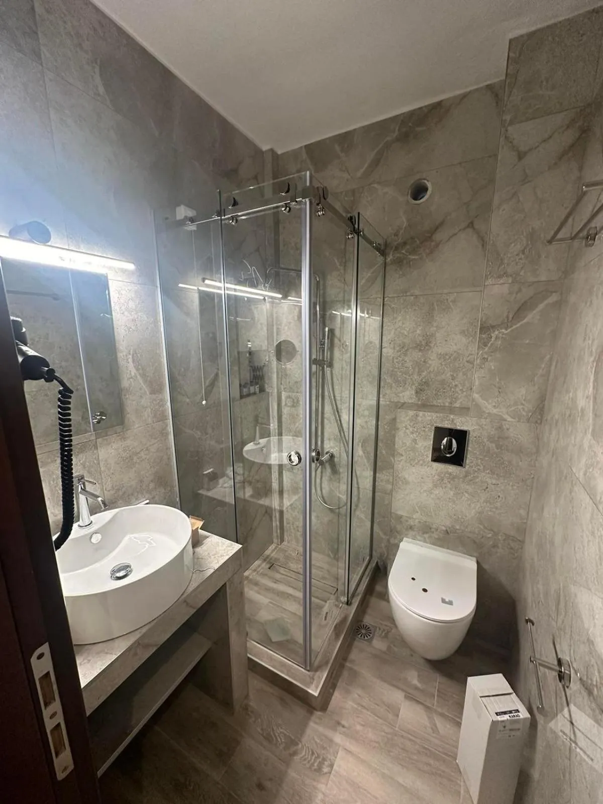 Bathroom in Meliton Inn Hotel & Suites by the beach