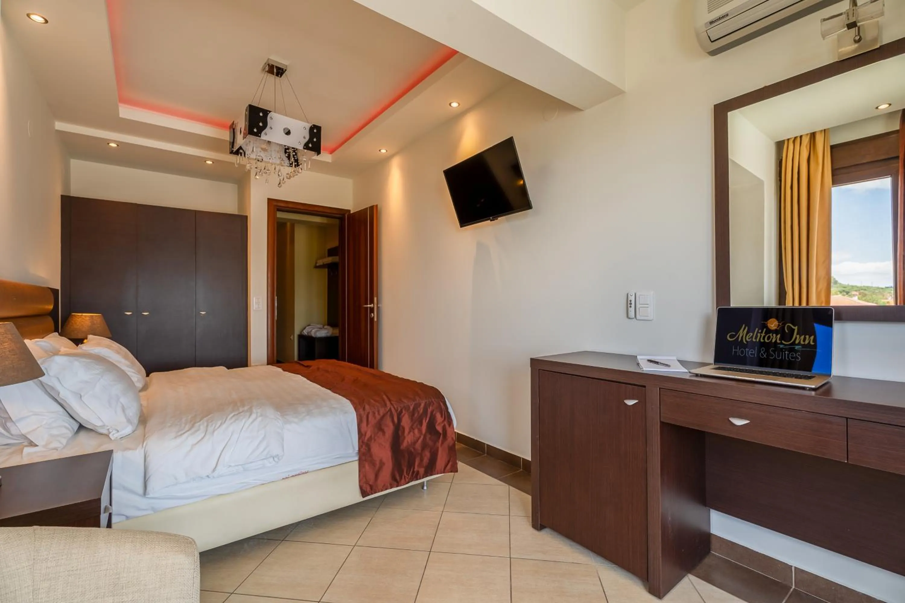 Bed in Meliton Inn Hotel & Suites by the beach