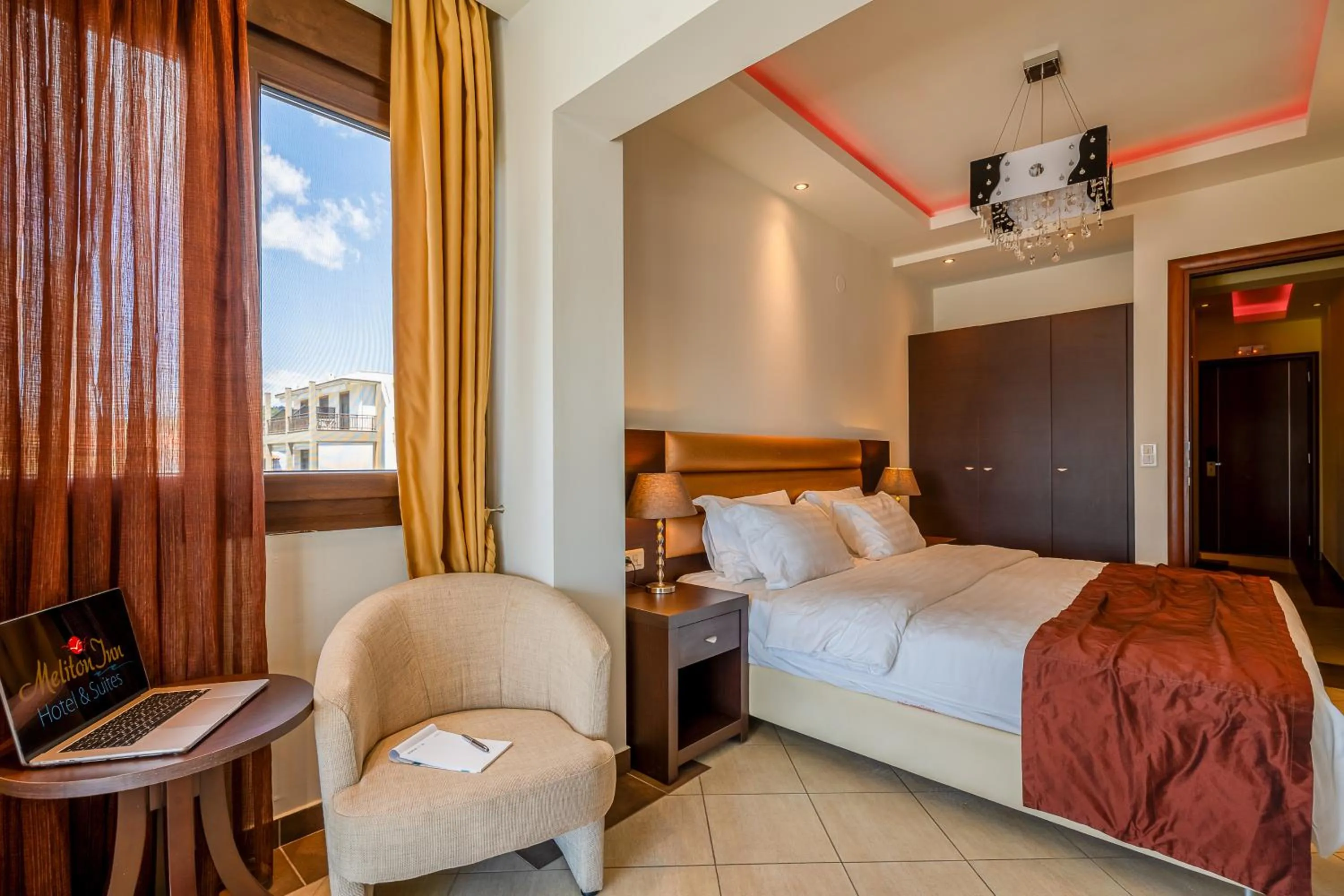 Bed in Meliton Inn Hotel & Suites by the beach