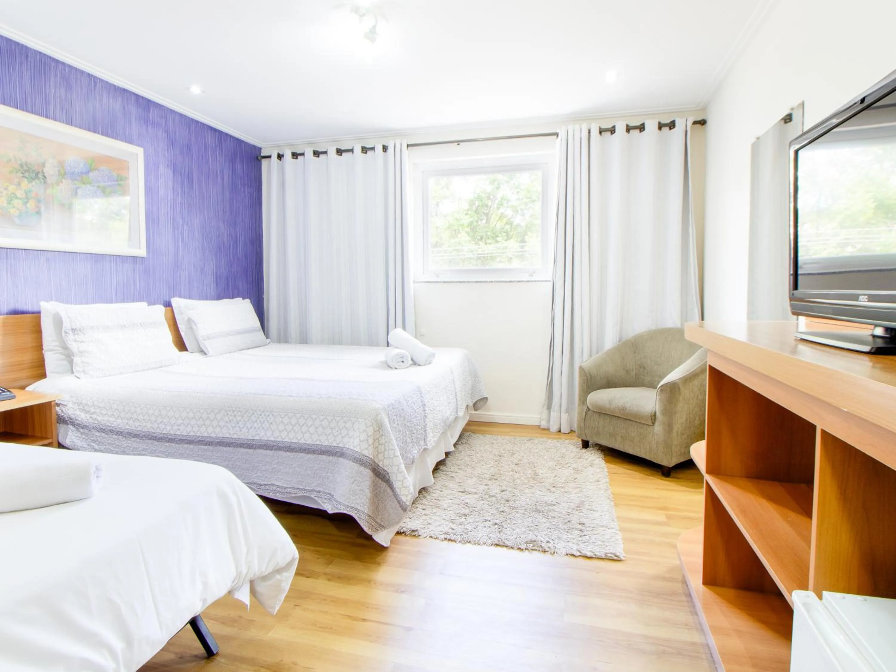 Bed in VELINN Pousada Chateau do Luar