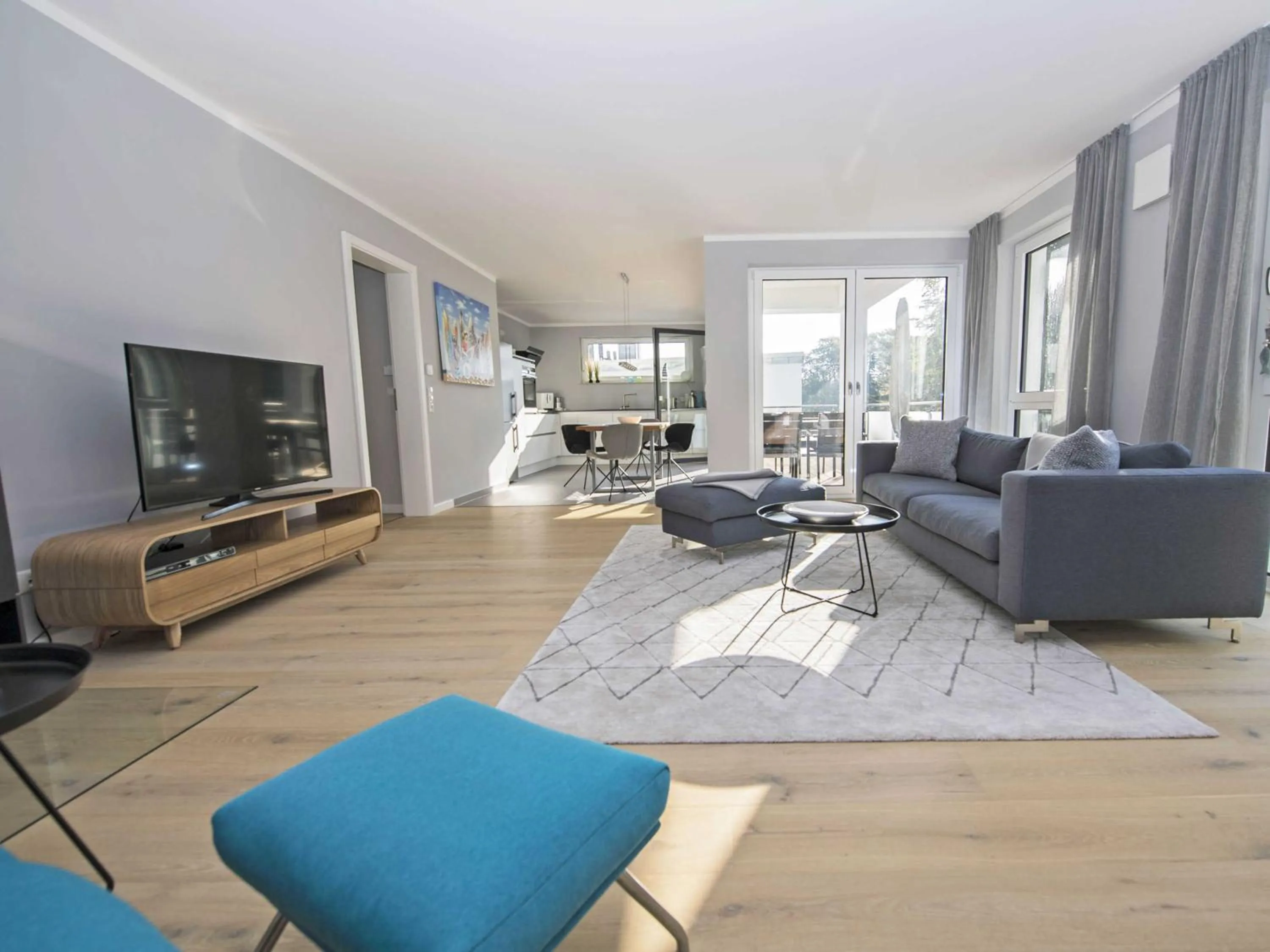 Communal lounge/ TV room in Haus Königsstuhl in Sellin - Penthouse mit Kamin und Balkon