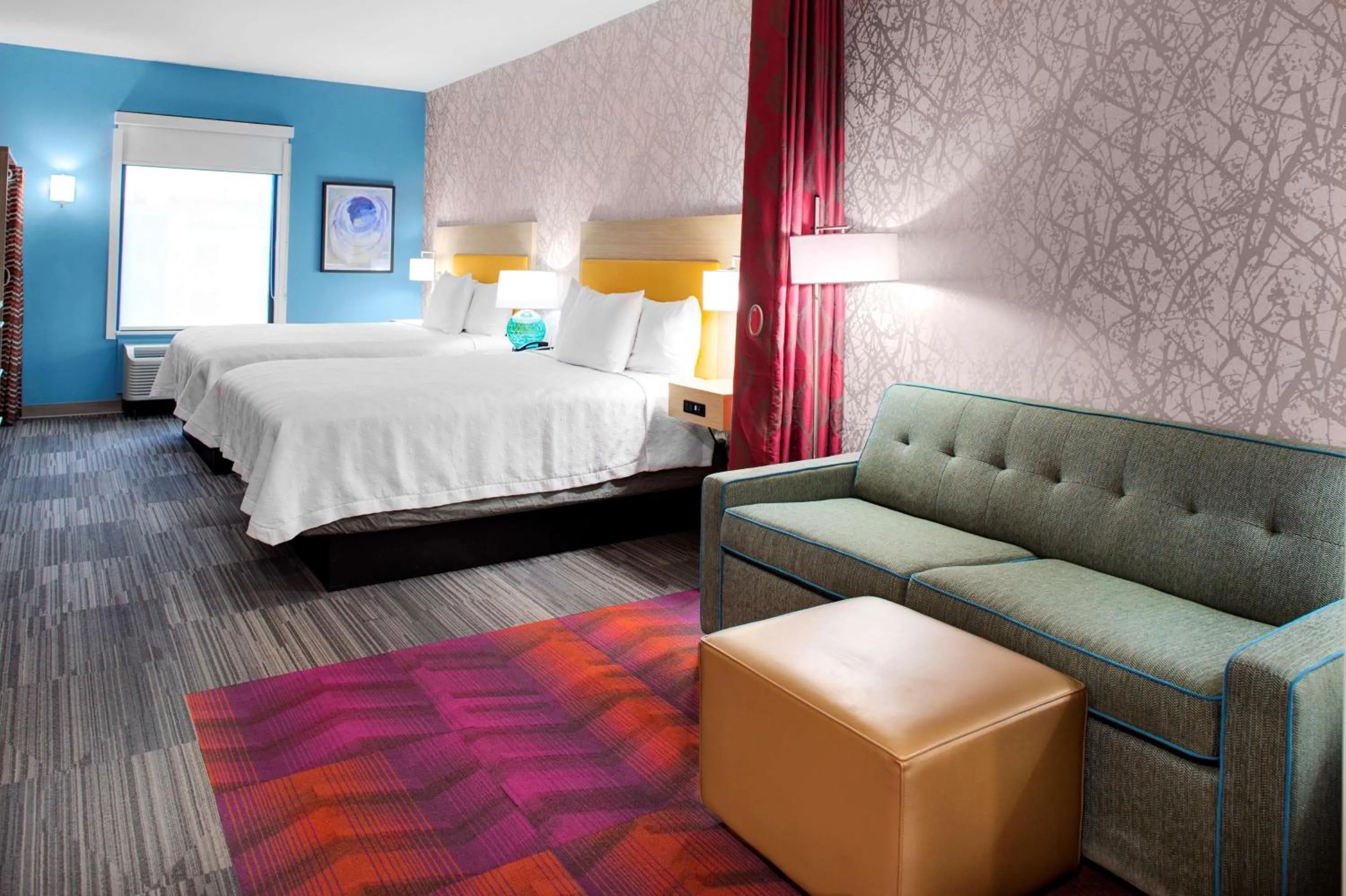 Living room, Bed in Home2 Suites By Hilton Lake Charles