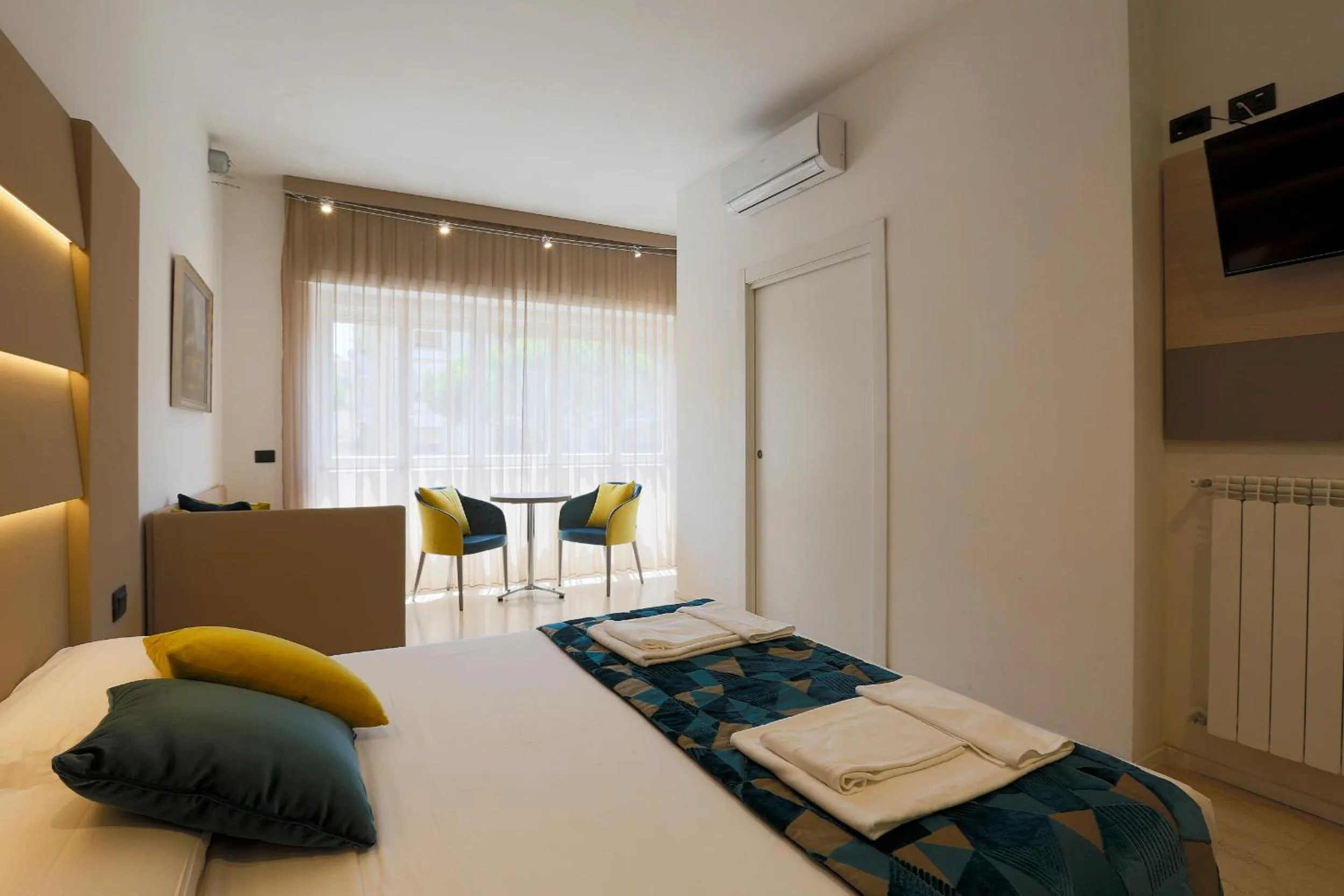 Bed in DaVinci Relais Guest House