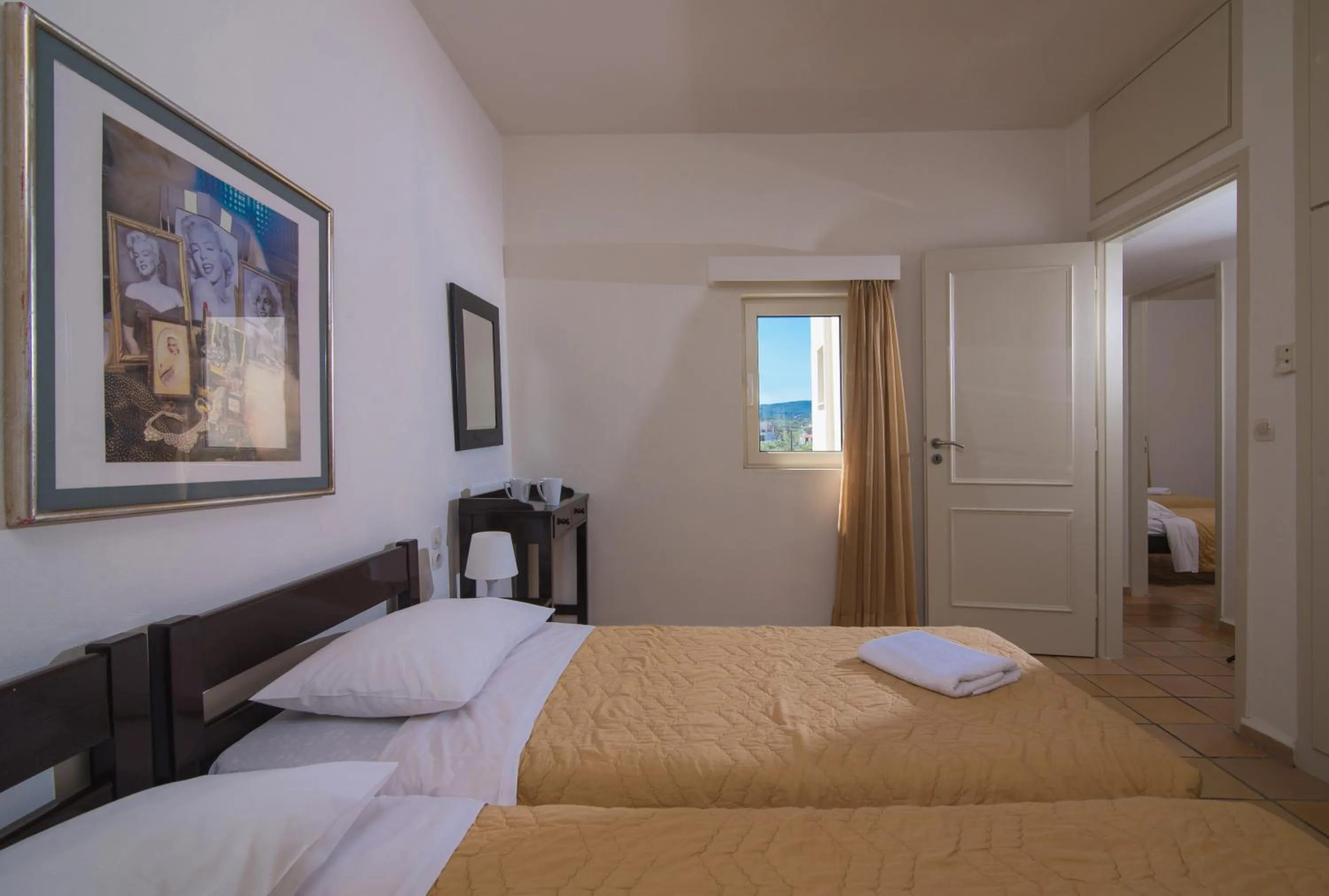 Bedroom, Bed in Ourania Apartments Hotel