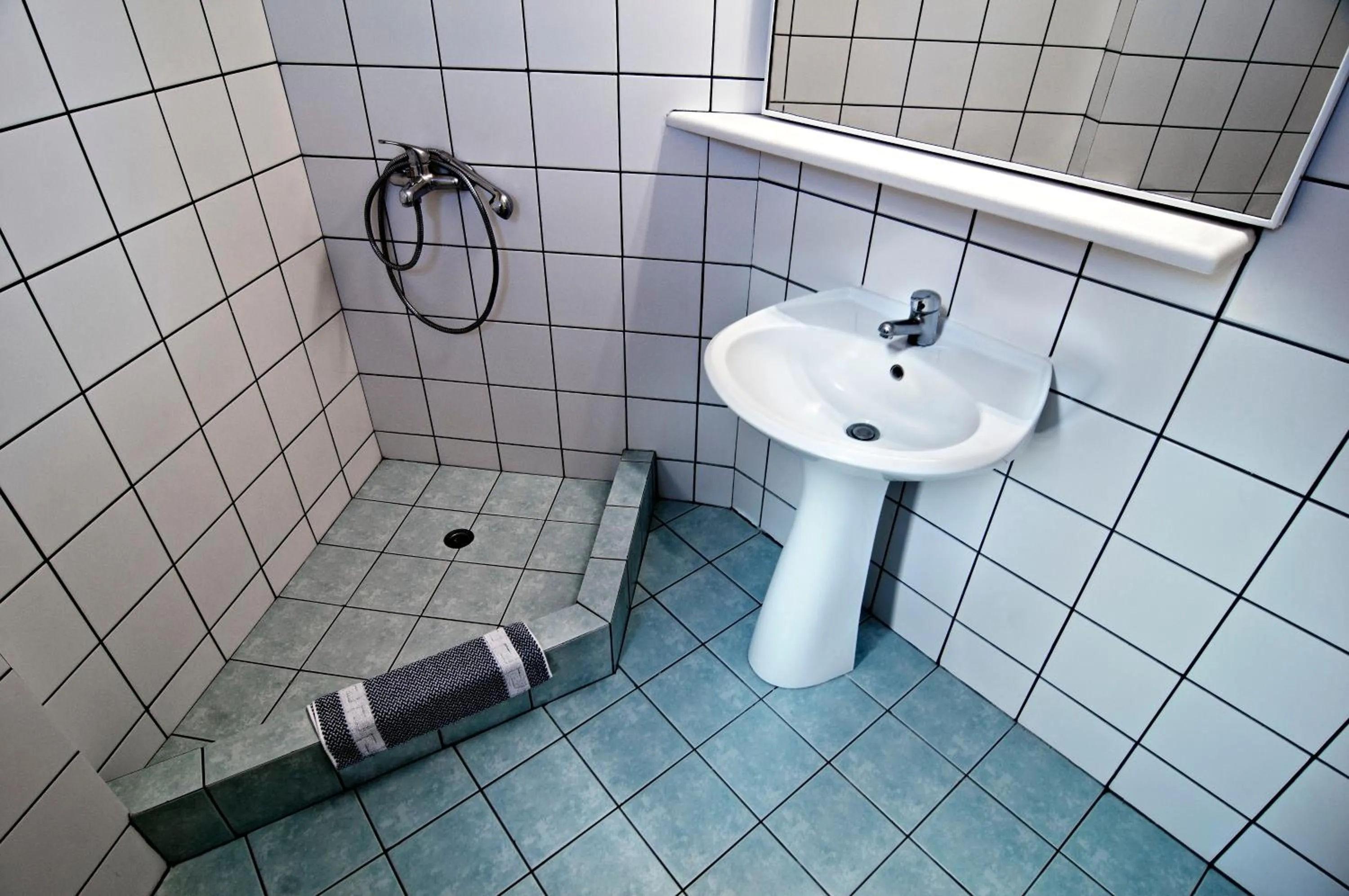 Shower in Ourania Apartments Hotel