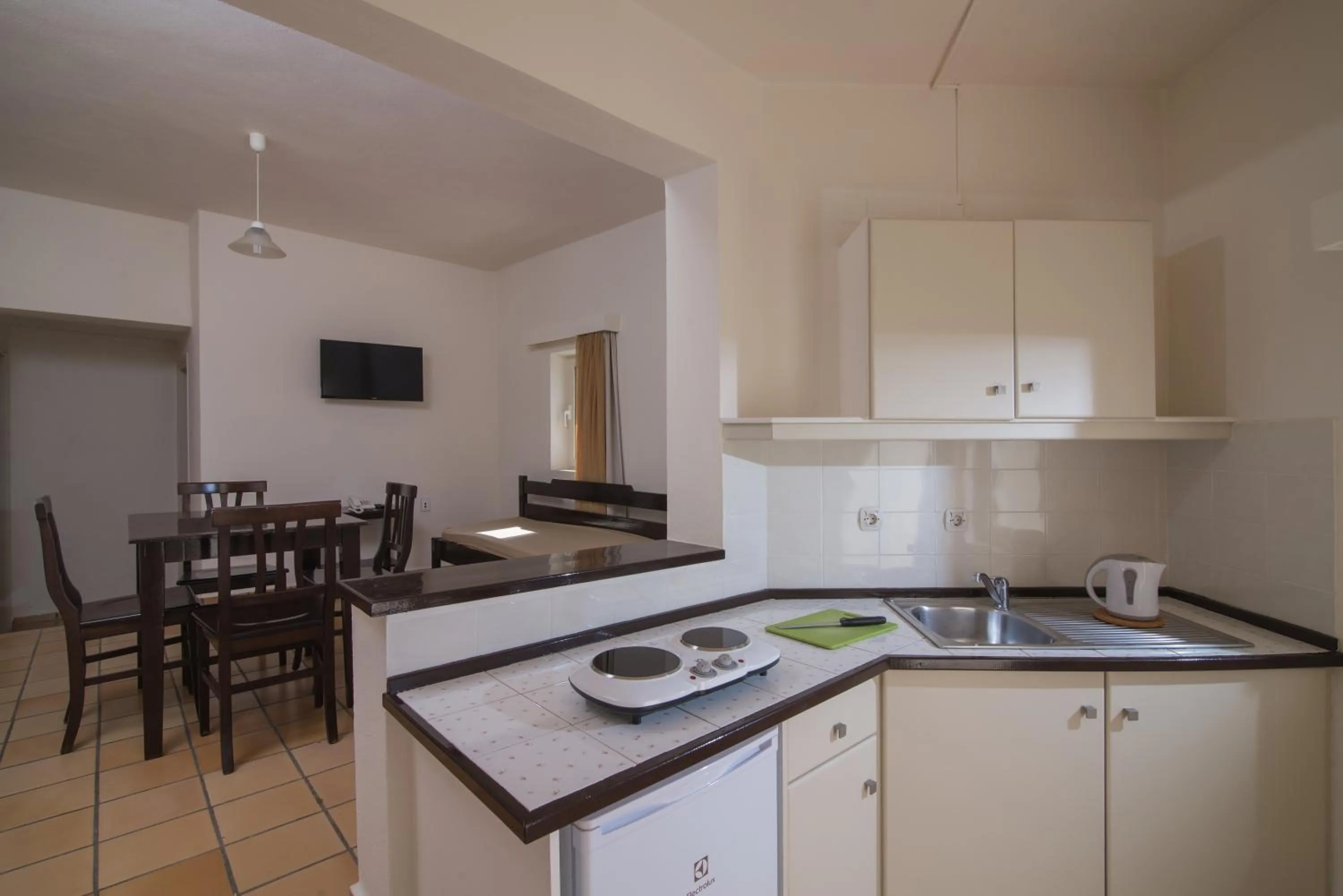 Kitchen or kitchenette in Ourania Apartments Hotel
