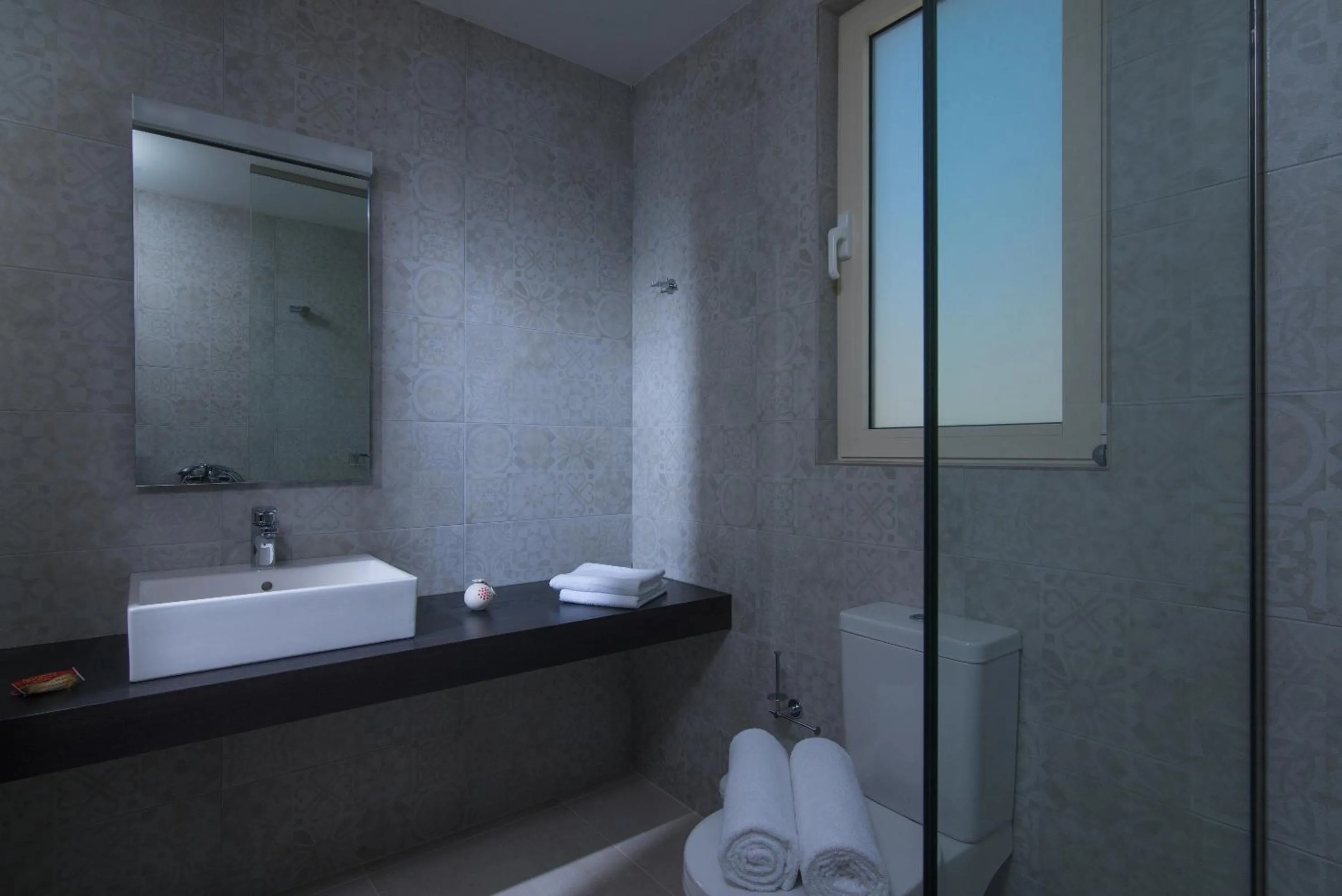 Bathroom in Ourania Apartments Hotel